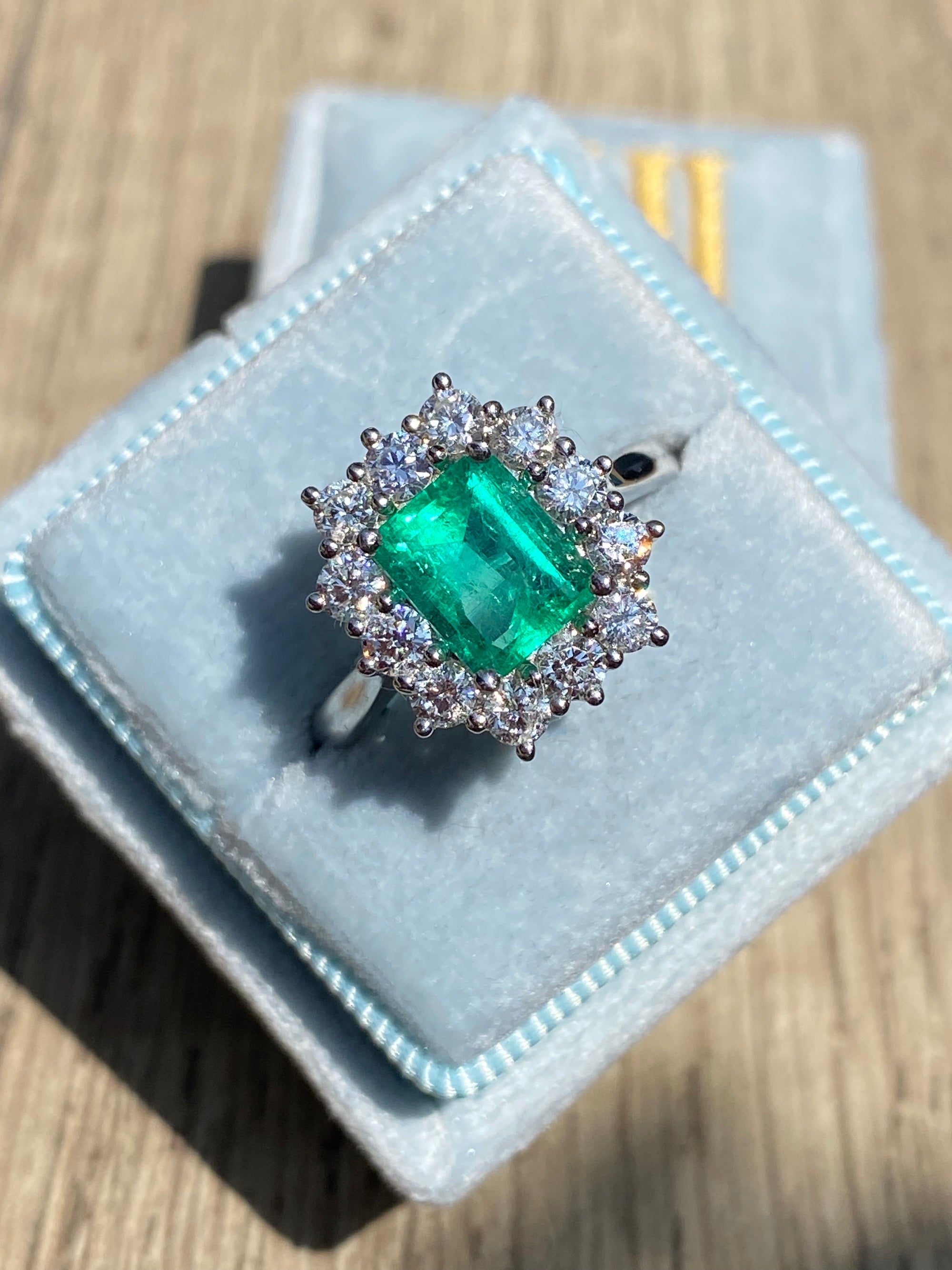 2.34 CTW Emerald Cut Colombian Emerald and Natural Diamond Halo Ring in Platinum