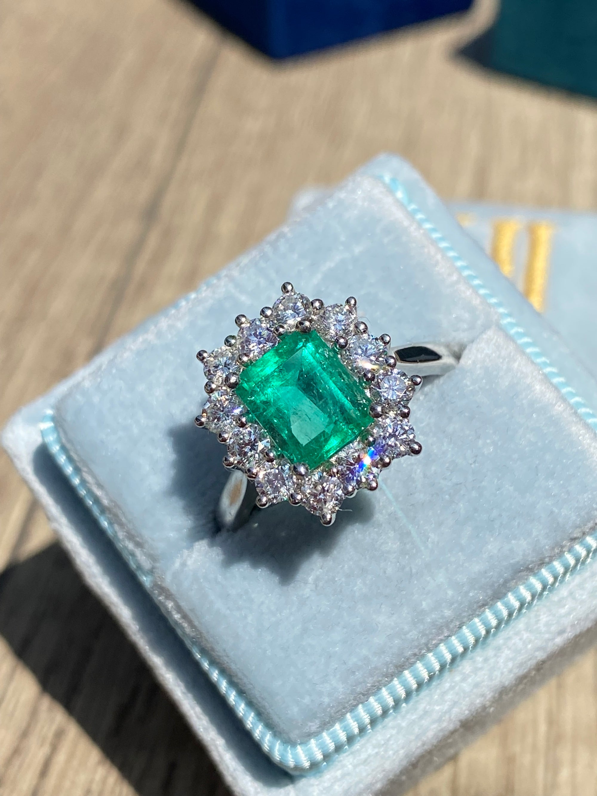2.34 CTW Emerald Cut Colombian Emerald and Natural Diamond Halo Ring in Platinum