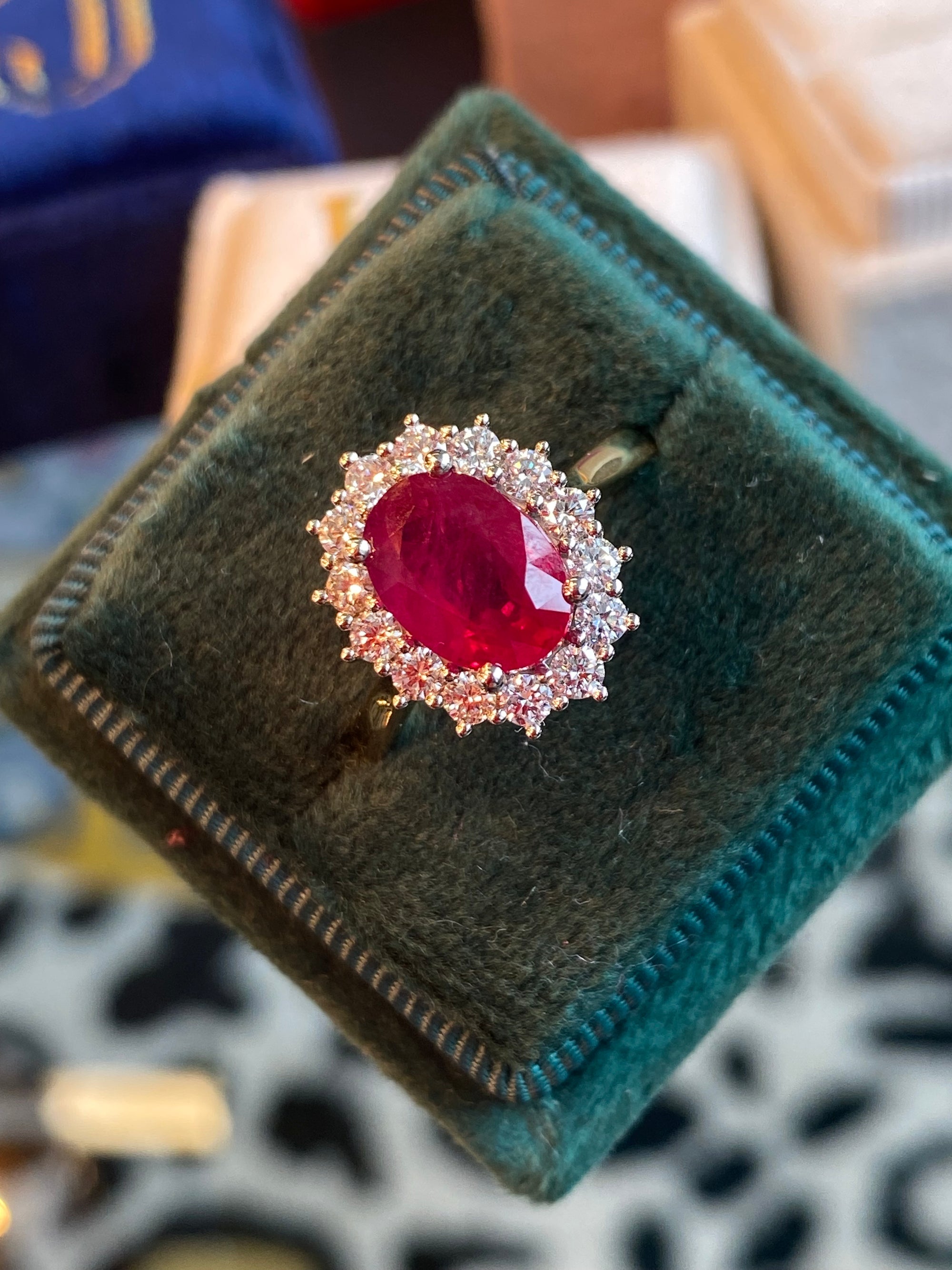 2.95ctw Oval-Cut Ruby and Natural Diamond Halo Ring in Platinum and 18ct Yellow Gold