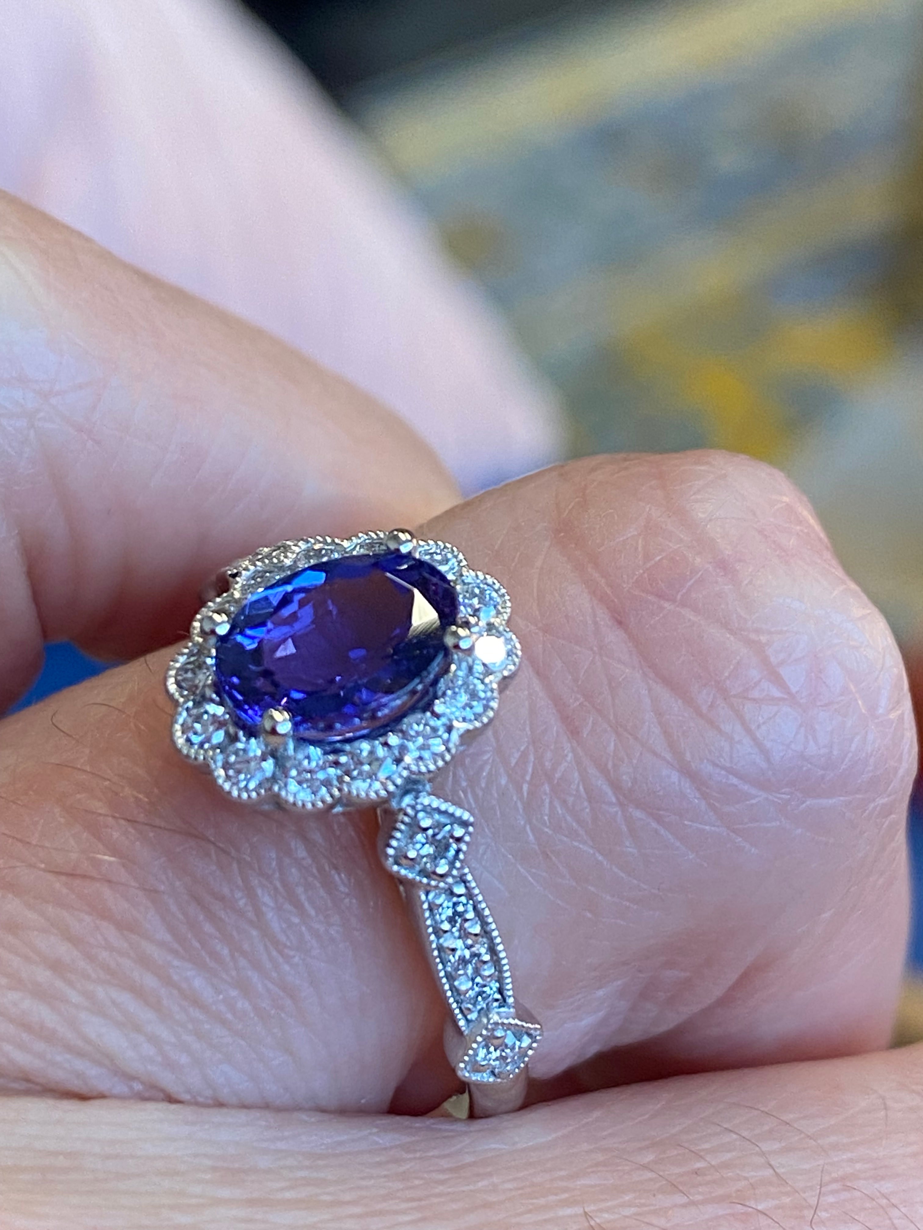 1.44 CTW Tanzanite and Natural Diamond Halo Ring in Platinum