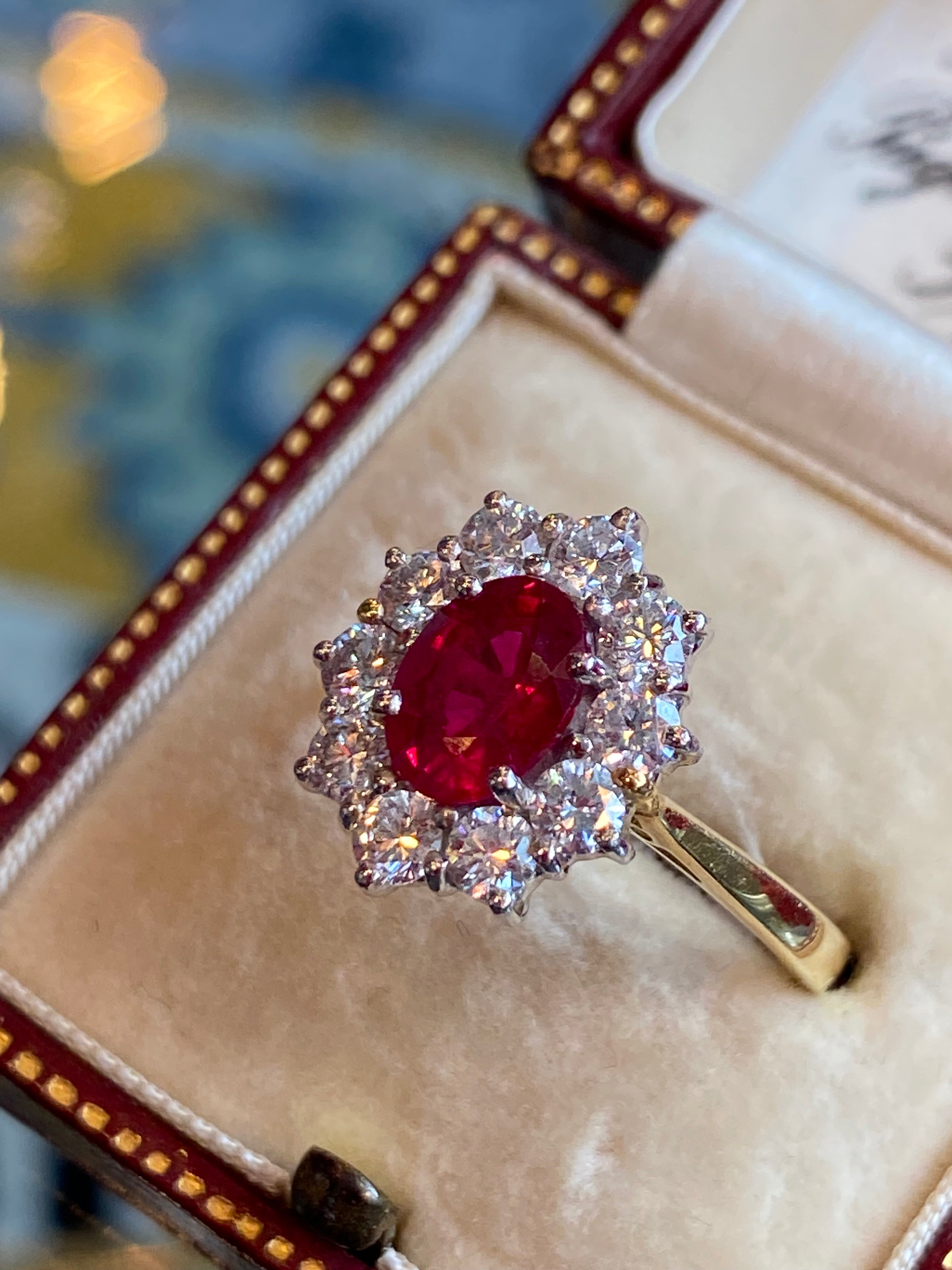 Breathtaking Ruby and Natural Diamond Halo Ring in 18ct Gold