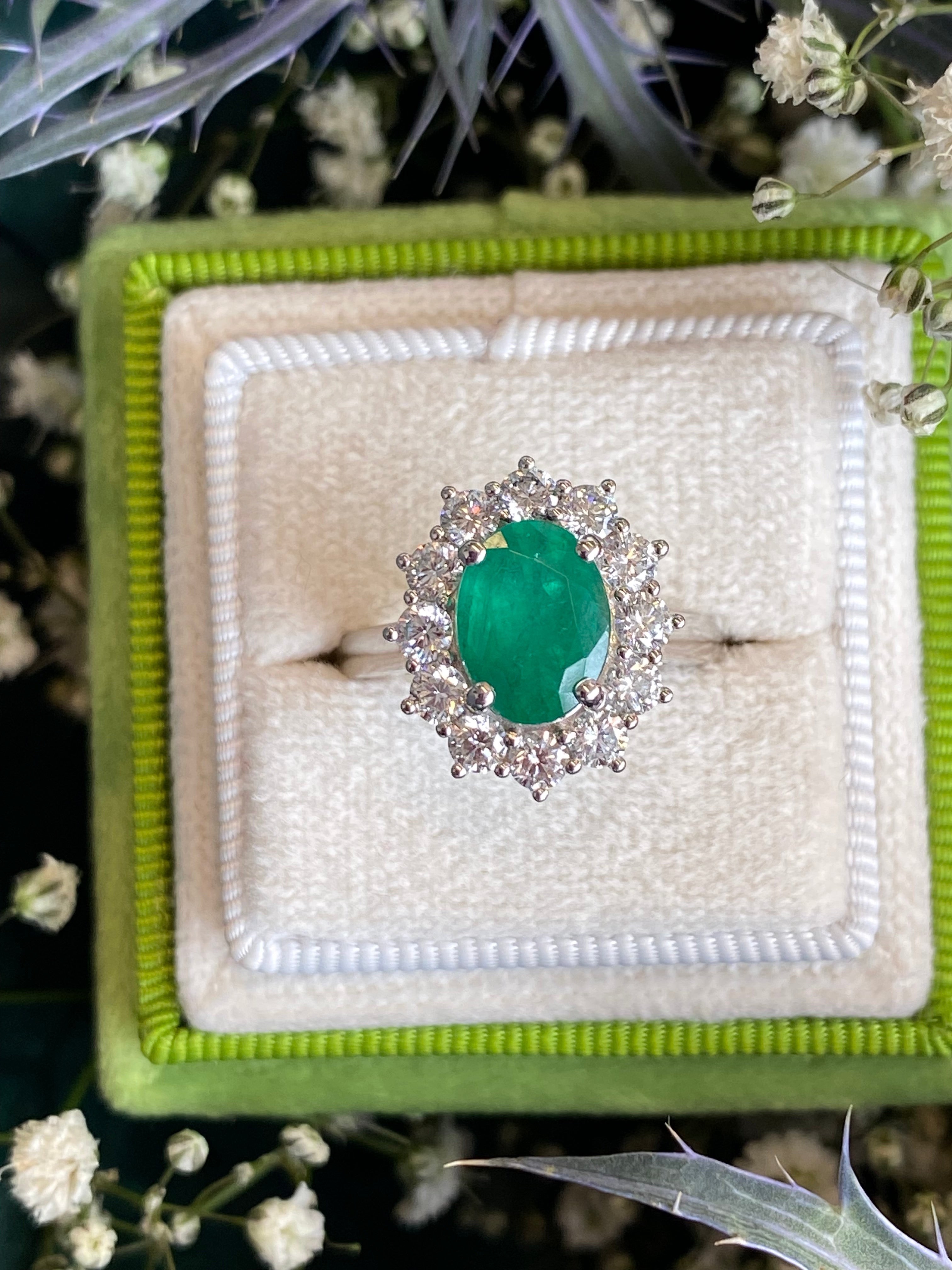 1.53 Carat Cushion Cut Emerald and 0.96 CTW Natural Diamond Halo Ring in Platinum