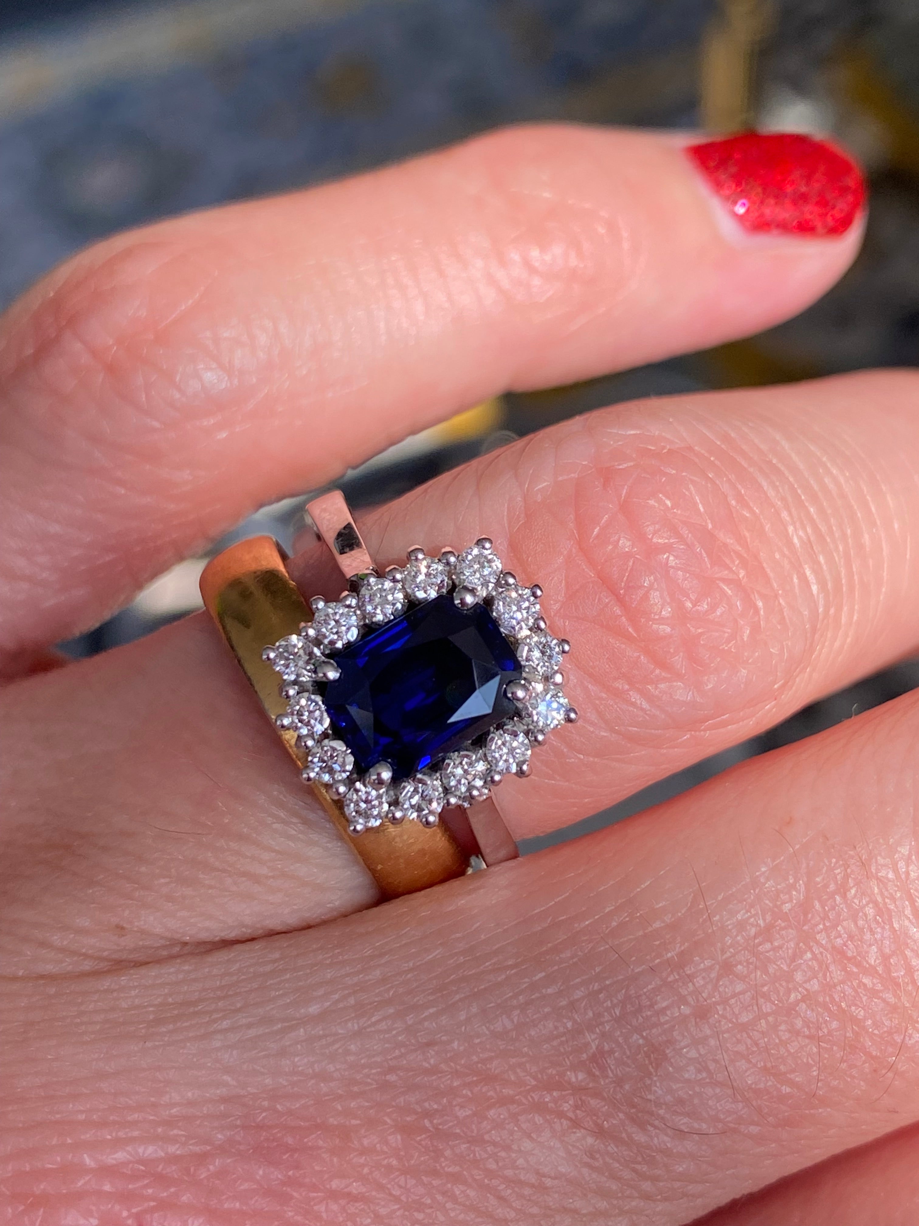 Vintage 2.05 Carat Sapphire and Natural Diamond Halo Ring in Platinum