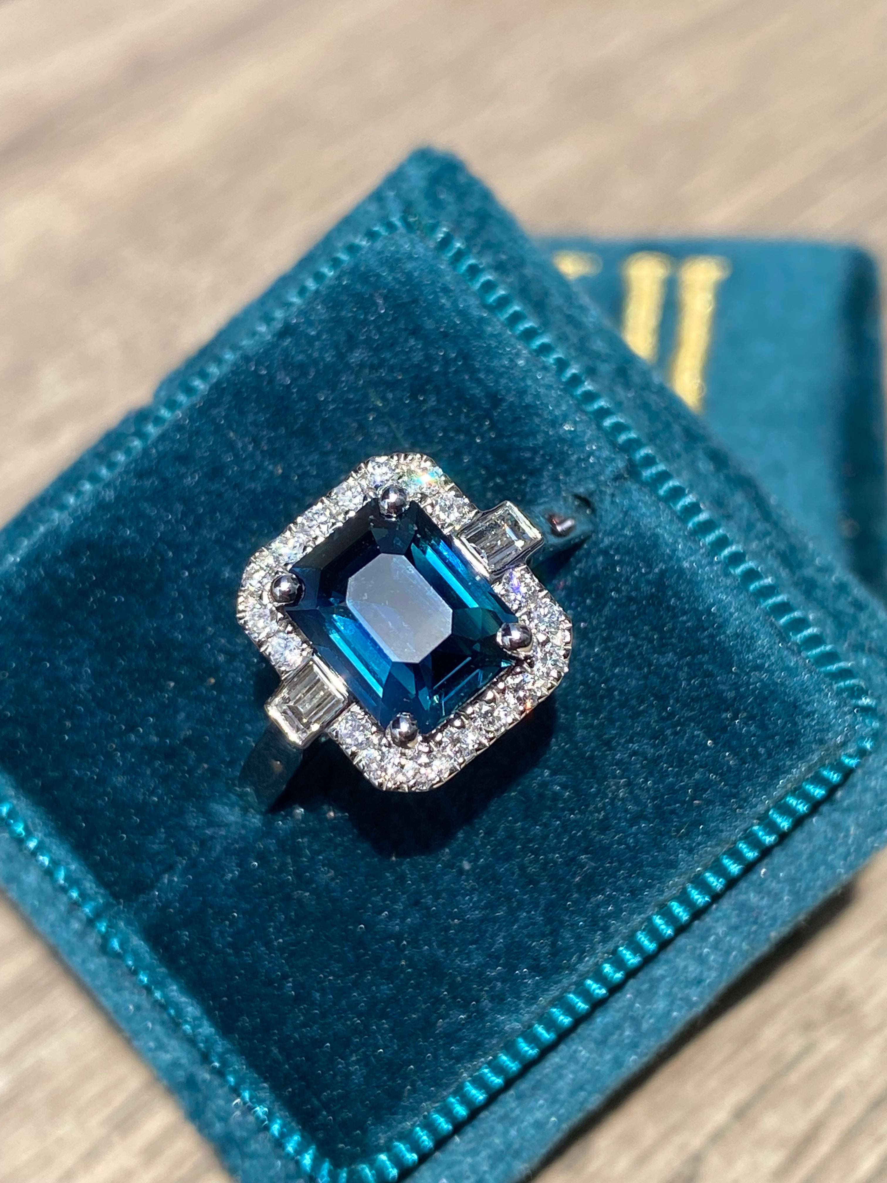 2.52 Carat Emerald Cut Teal Sapphire and Natural Diamond Halo Ring in Platinum
