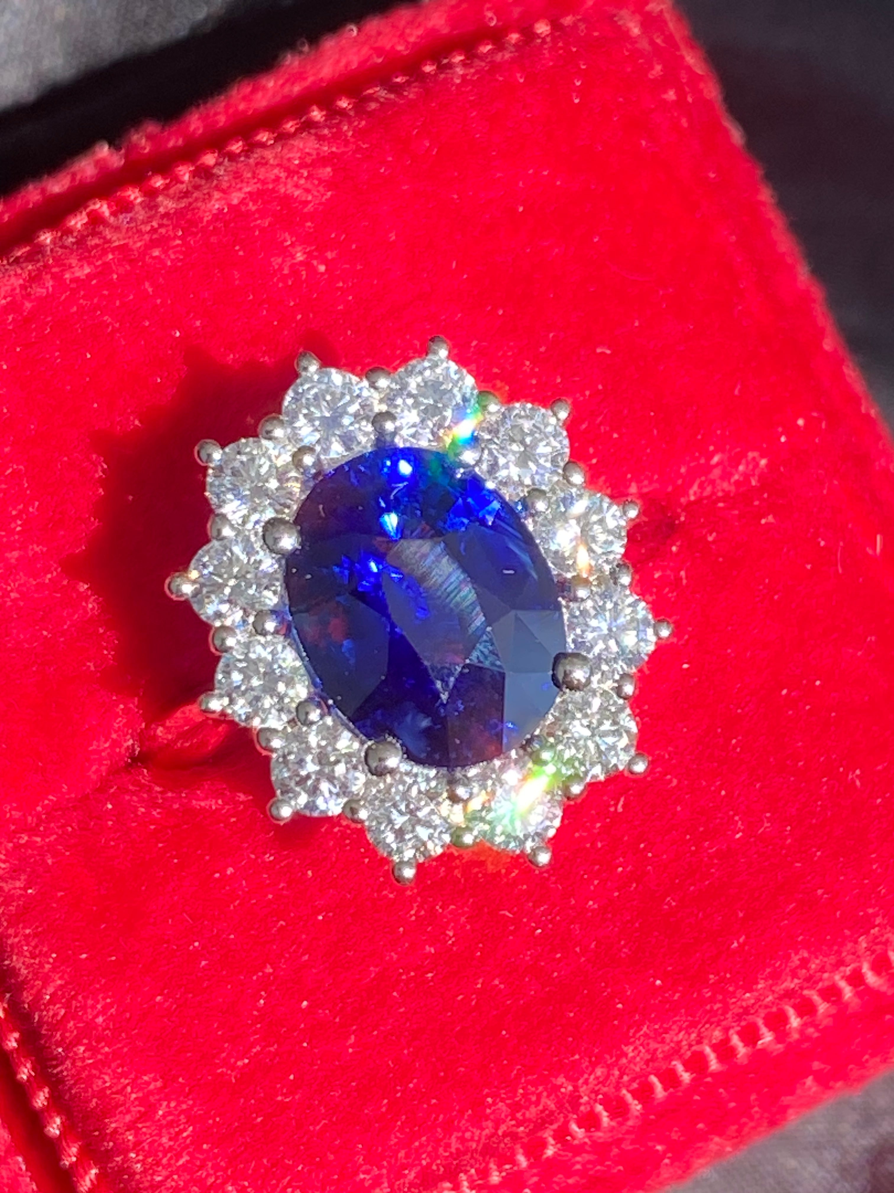 3.17 Carat Blue Ceylon Sapphire and 0.87 CTW Natural Diamond Halo Ring in Platinum