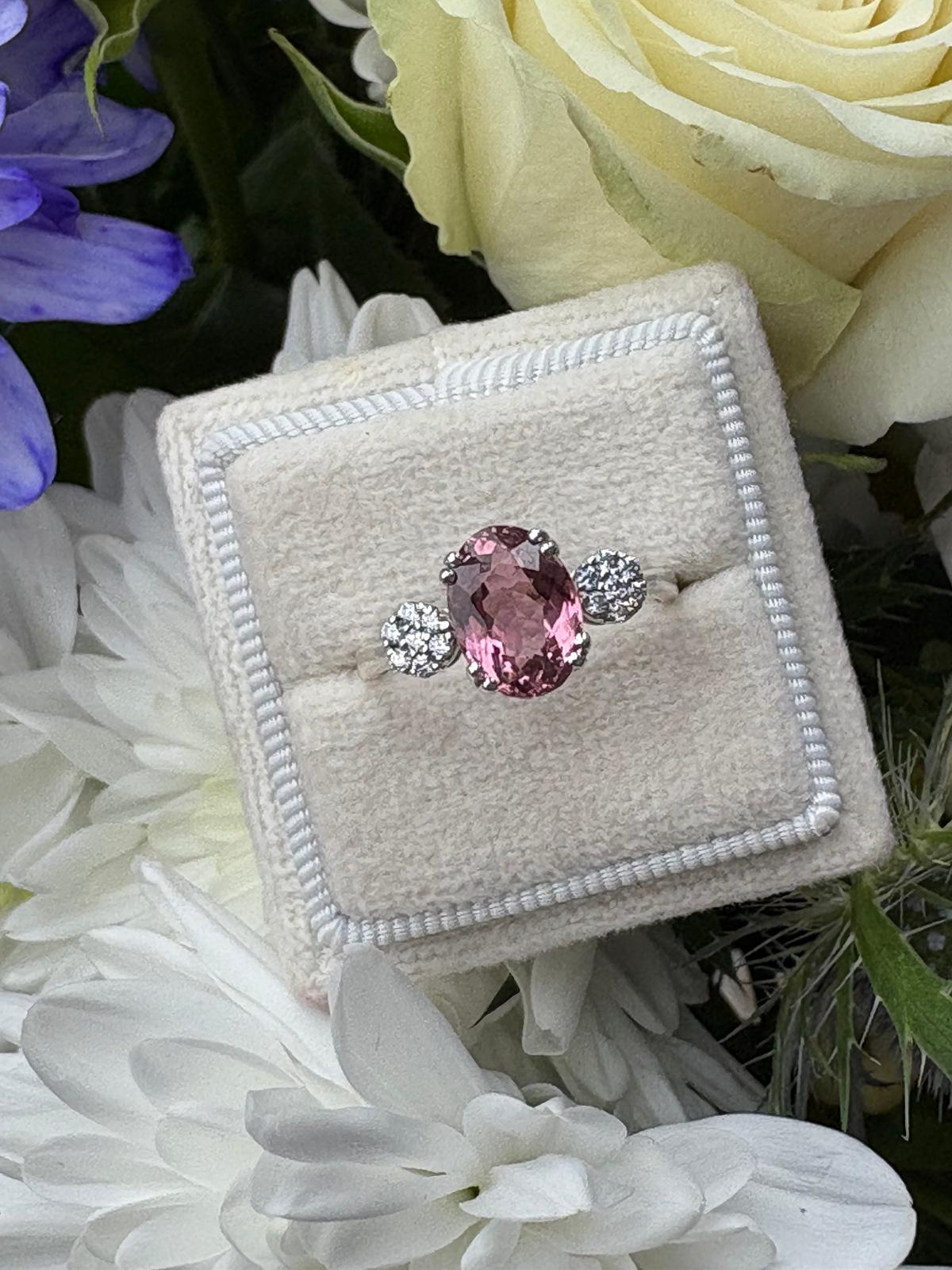 2.05 Carat Pink Tourmaline and Moissanite Three Stone Style Ring in Sterling Silver
