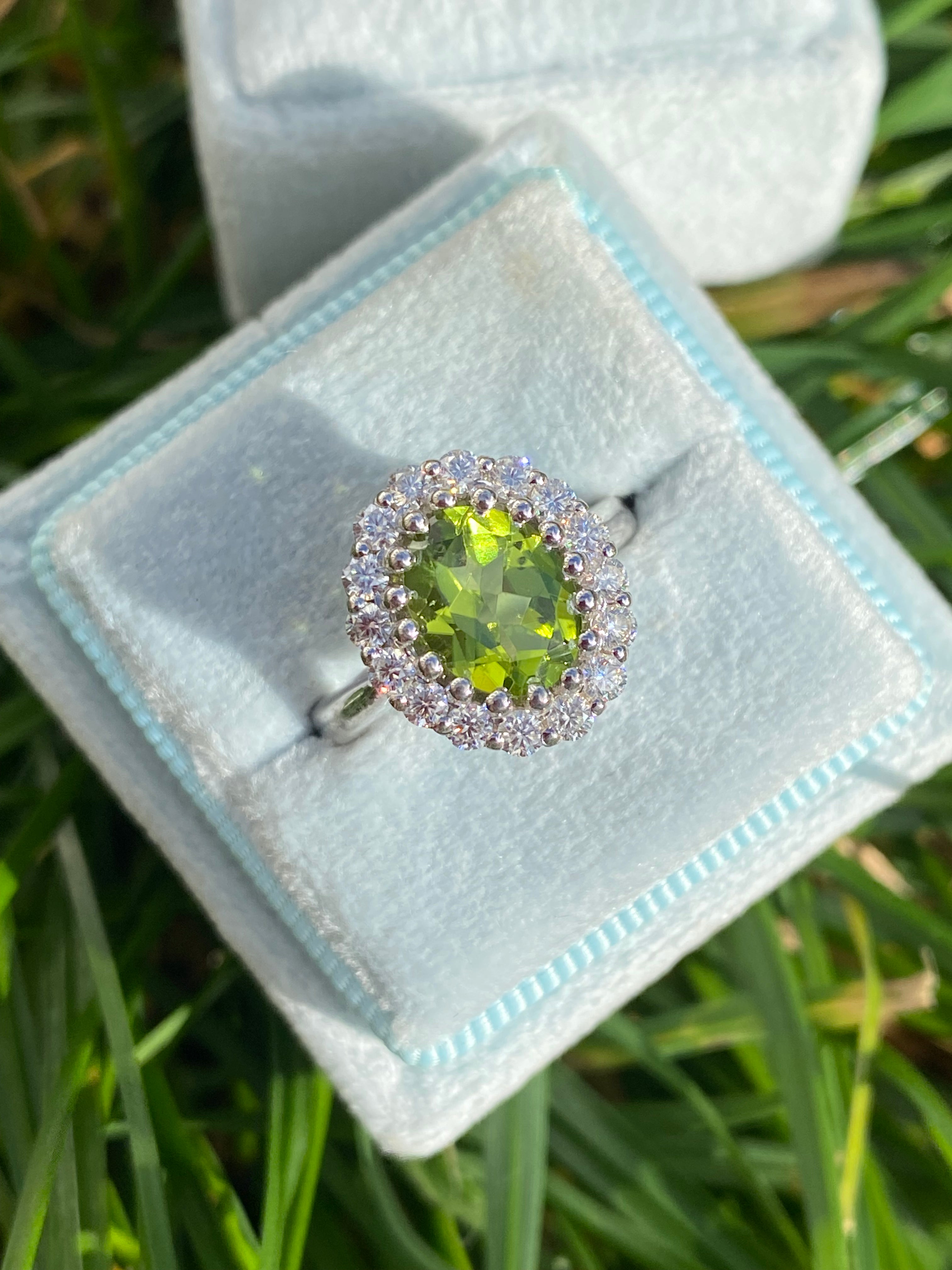 2.33 CTW Oval Cut Peridot and Moissanite Halo Cocktail Ring in Sterling Silver