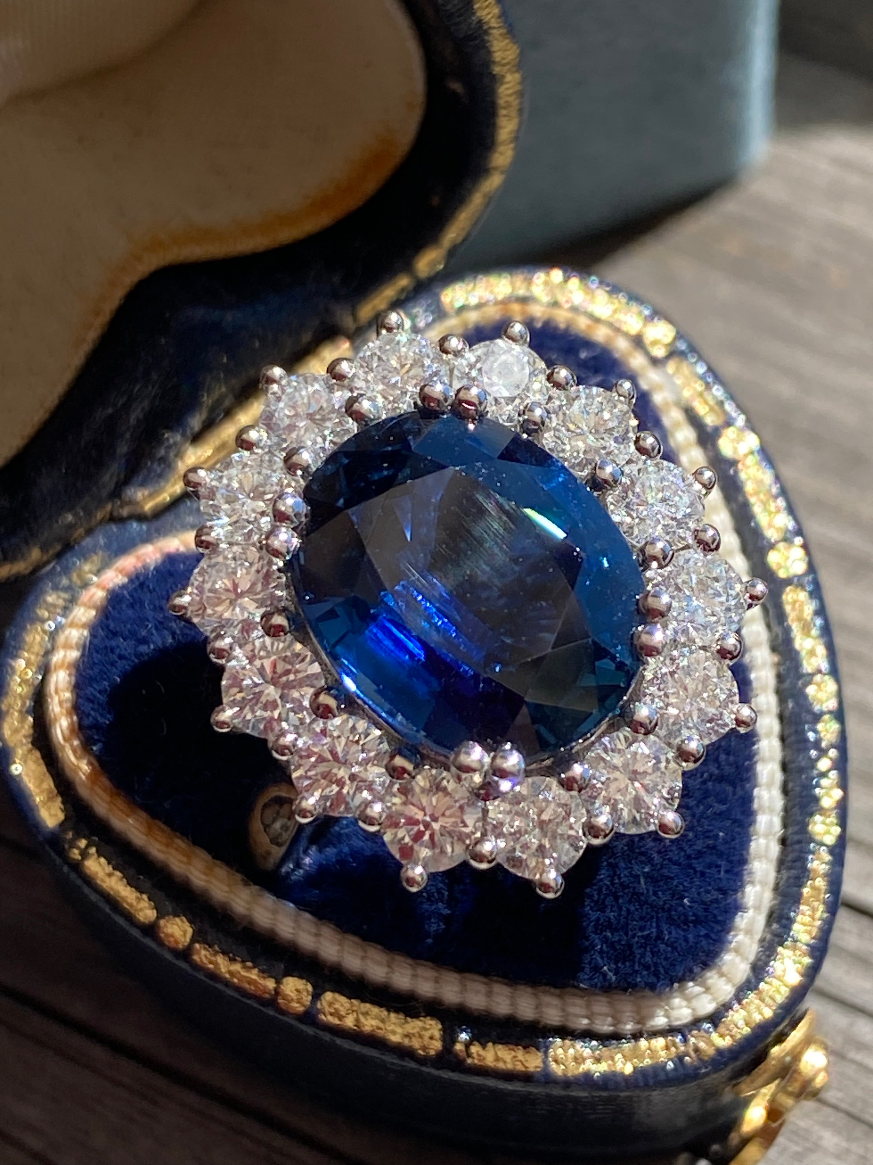6.37 Carat Gubelin Certed No Heat Blue Ceylon Sapphire and 1.80 CTW Natural Diamond Halo Ring in Platinum