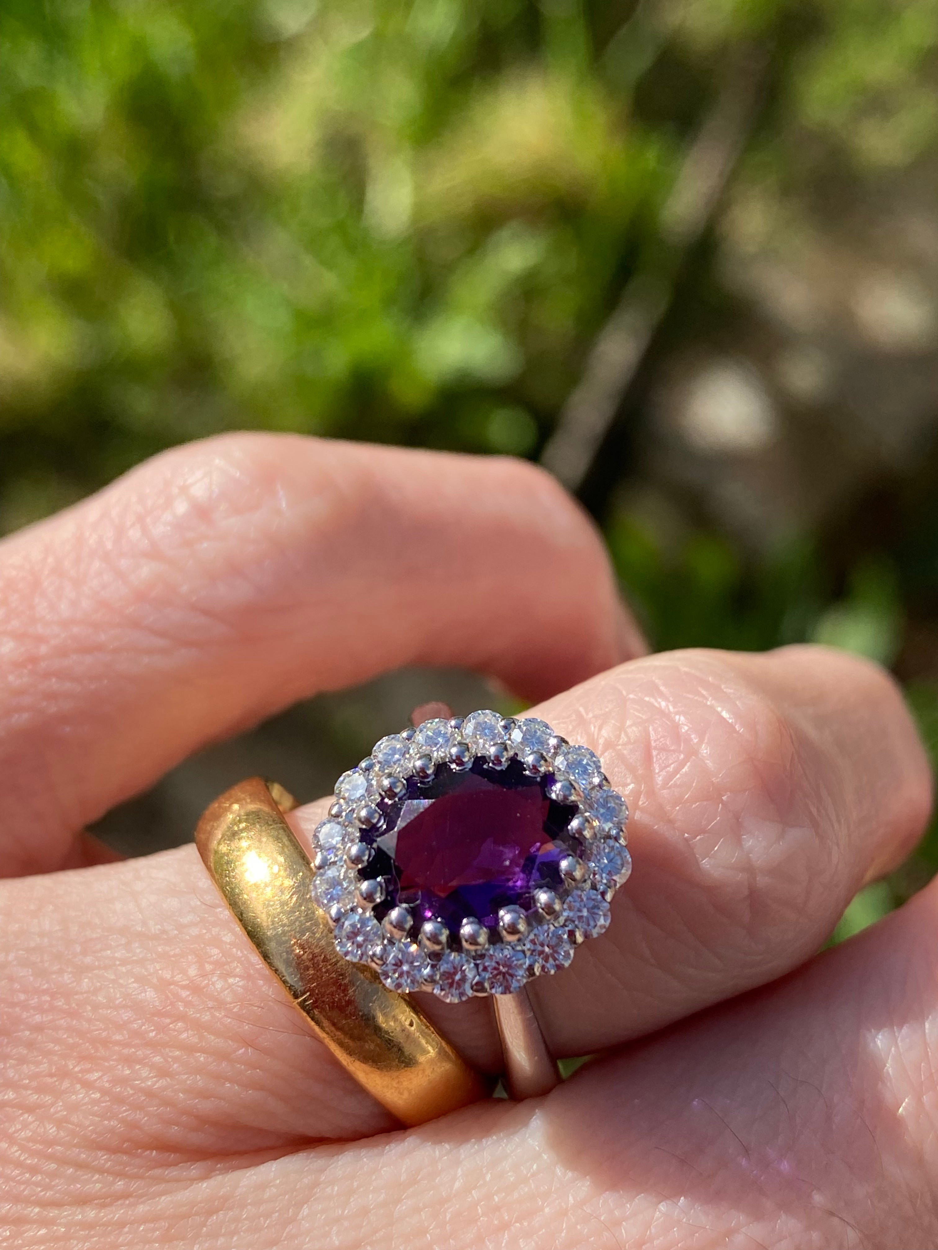2.33 CTW Oval Cut Amethyst and Moissanite Halo Cocktail Ring in Sterling Silver