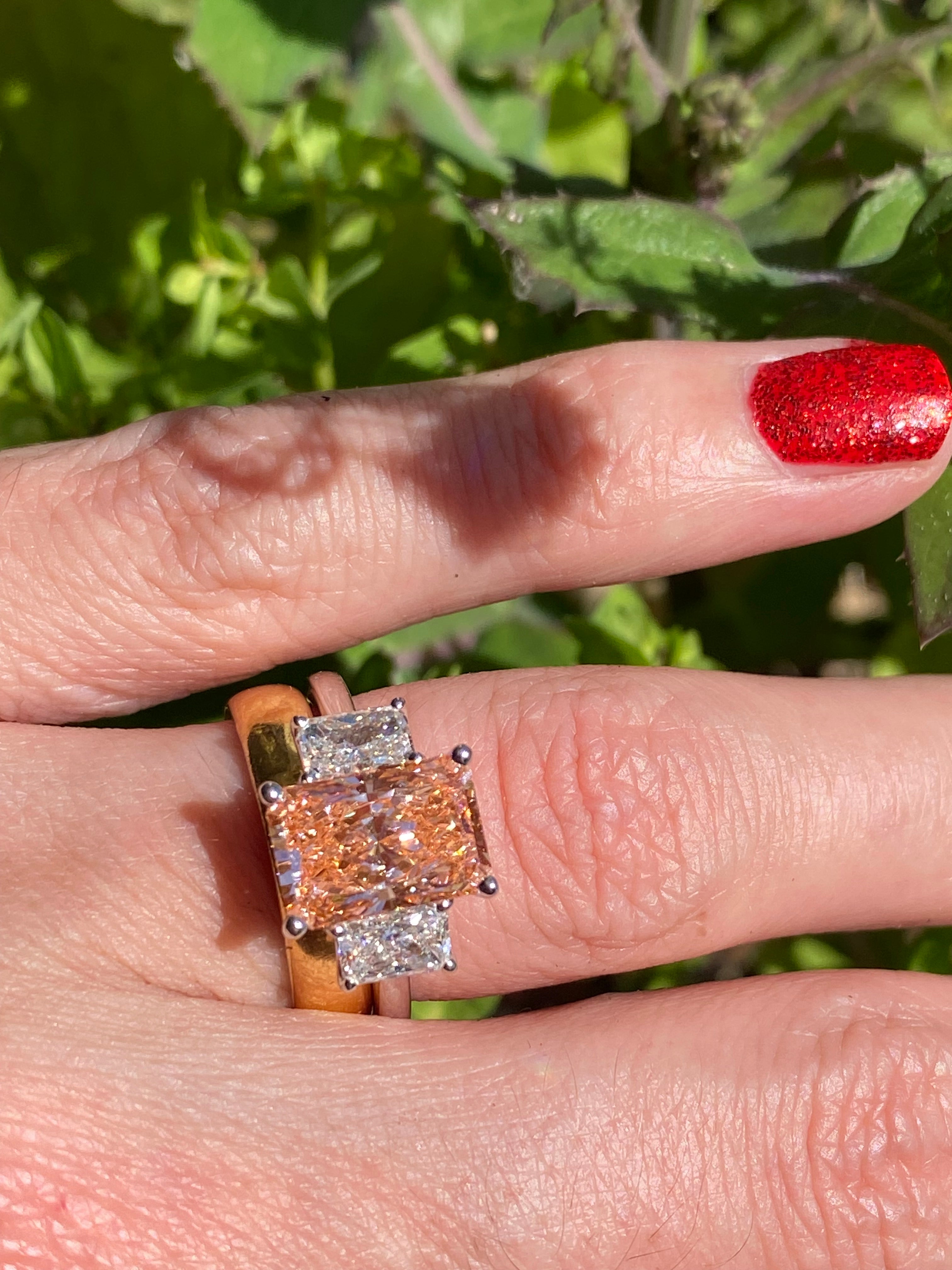 4.12 CTW Fancy Radiant Cut Pink Lab Grown Diamond Graduated Three Stone Ring in Platinum