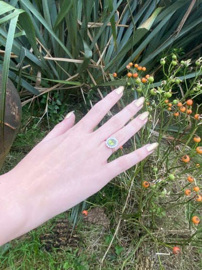 2.33 CTW Oval Cut Peridot and Moissanite Halo Cocktail Ring in Sterling Silver