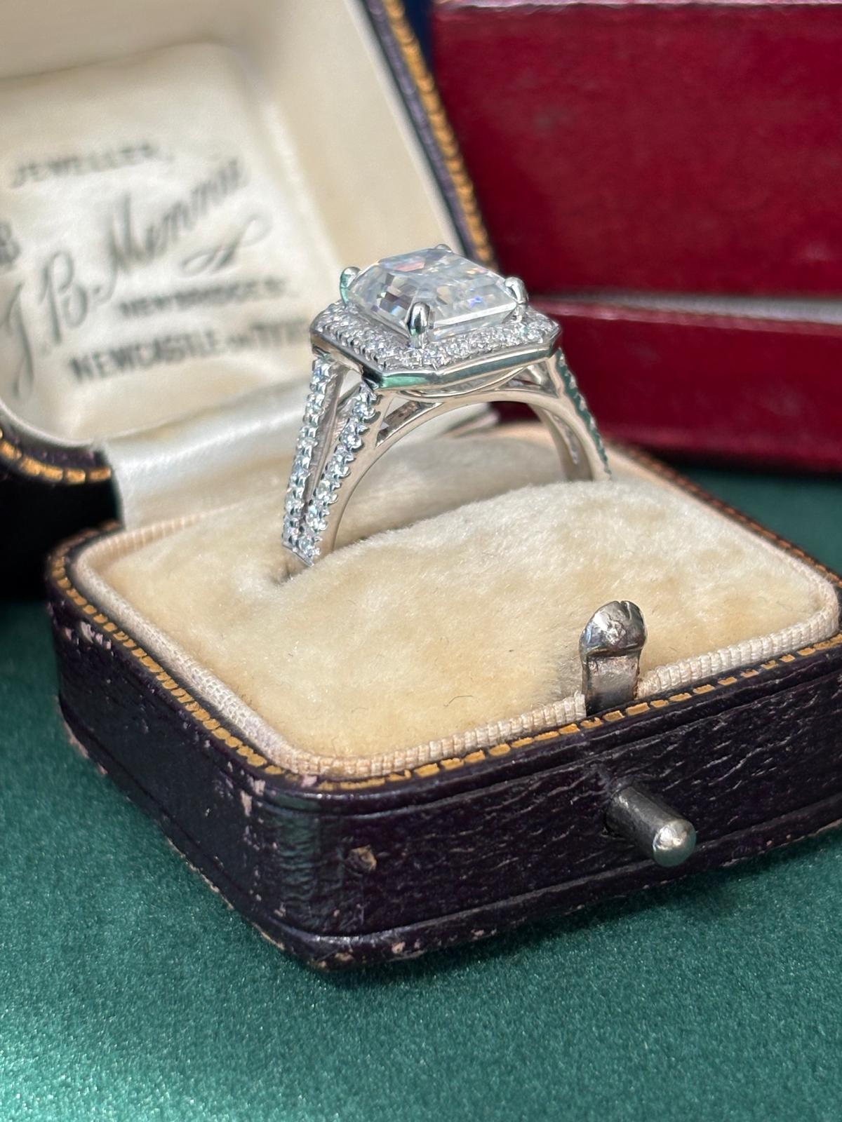 3.10 CTW Emerald Cut Moissanite Halo Ring in Sterling Silver