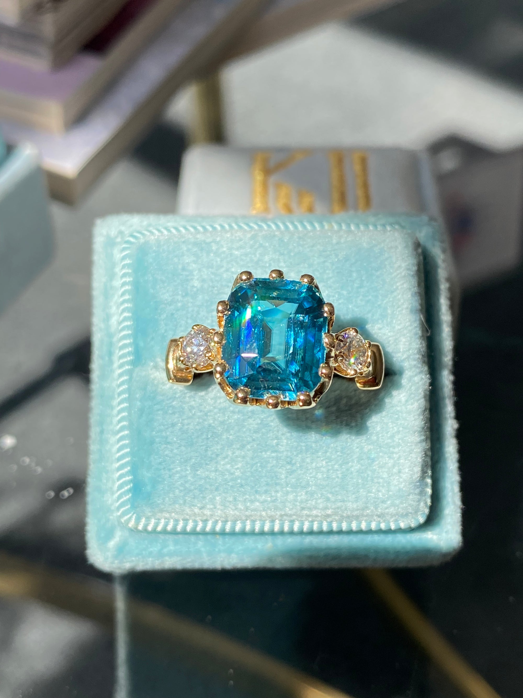 6.75 Carat Blue Zircon and Diamond Three Stone Ring in 18ct Yellow Gold