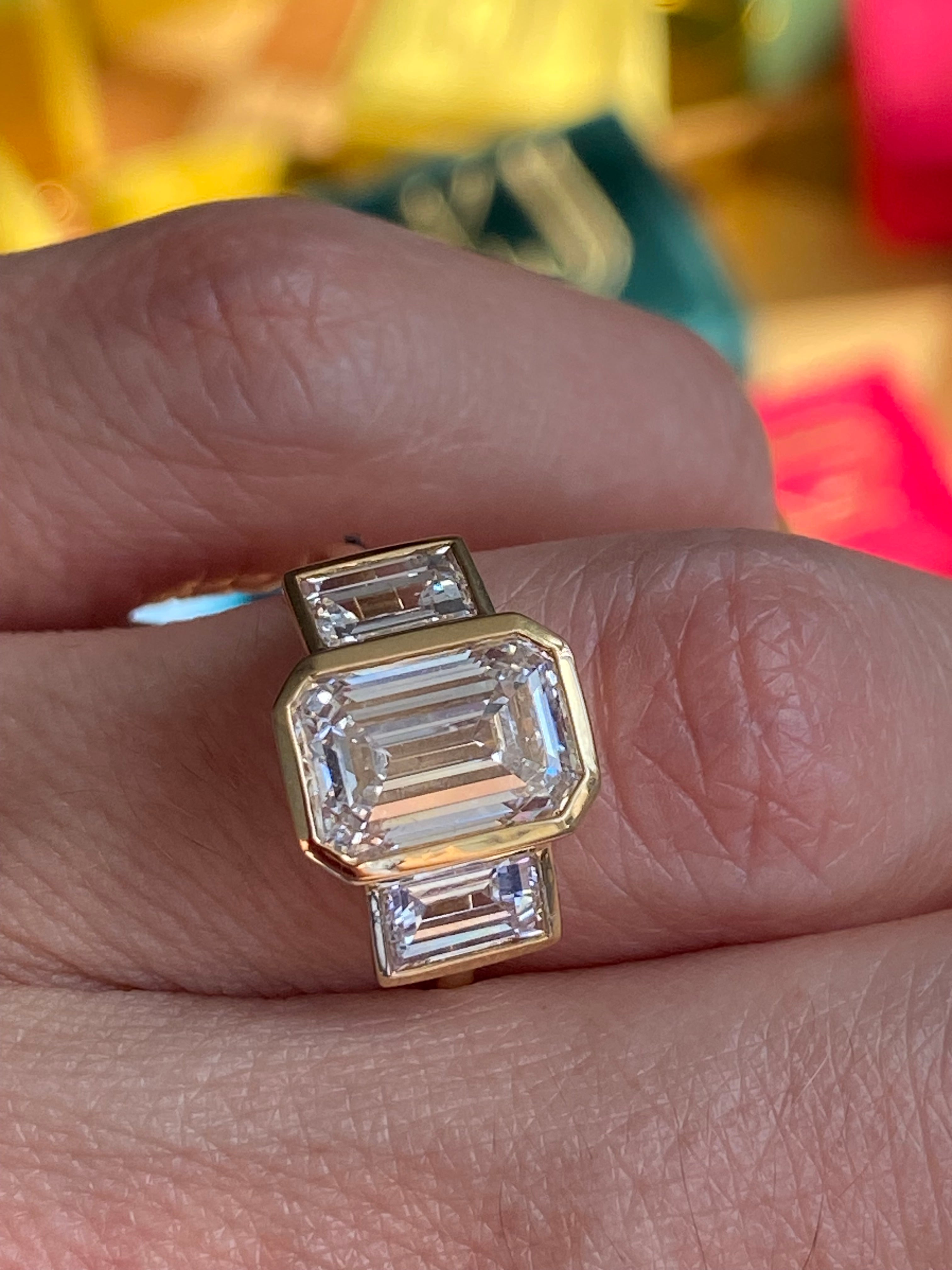 4.32 CTW Emerald Cut Bezel Set Lab Diamond Ring in 18ct Yellow Gold