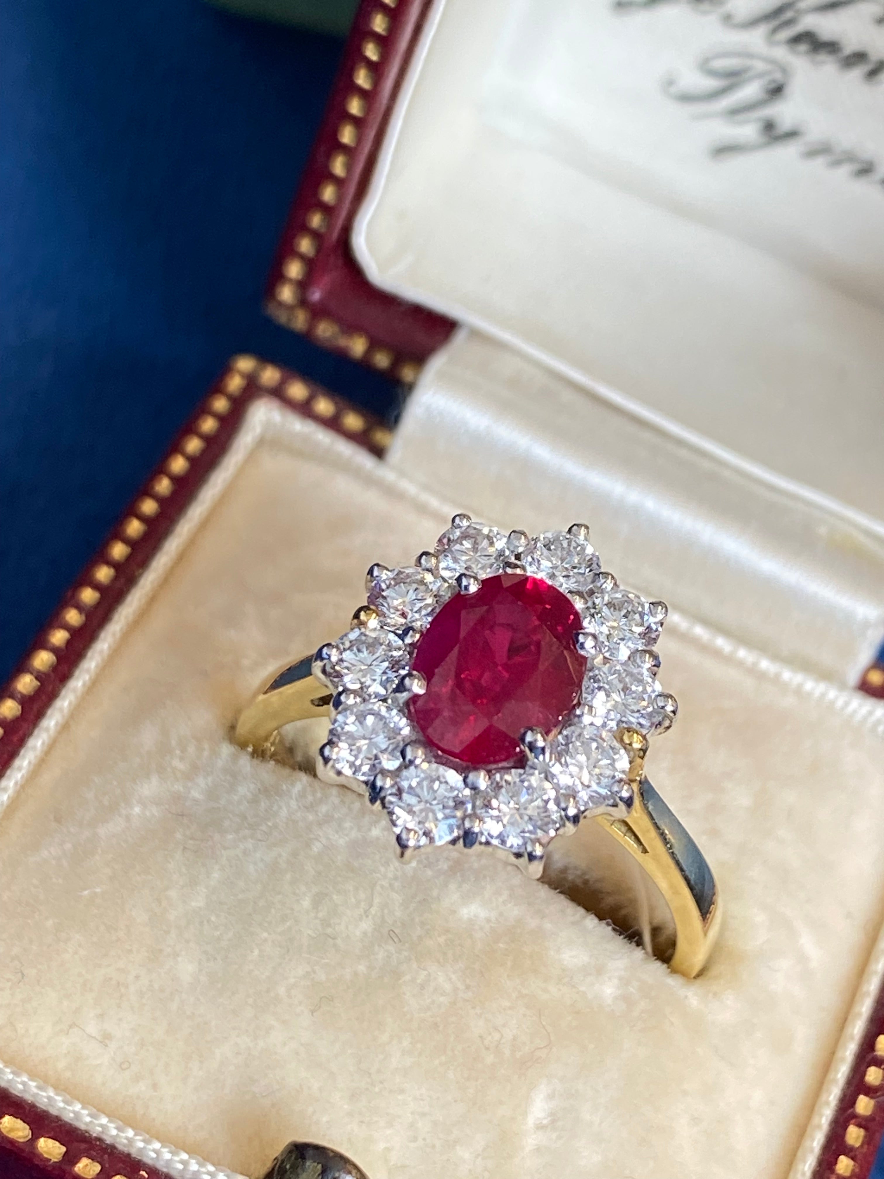 Breathtaking Ruby and Natural Diamond Halo Ring in 18ct Gold