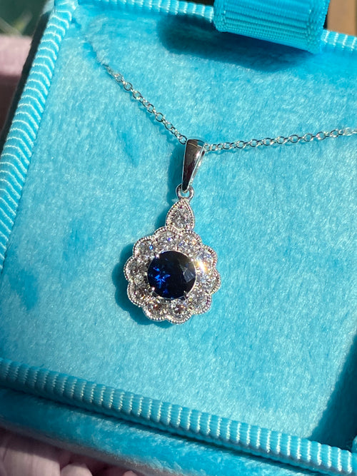 0.82 CTW Sapphire and Natural Diamond Pendant Necklace in 18ct White Gold