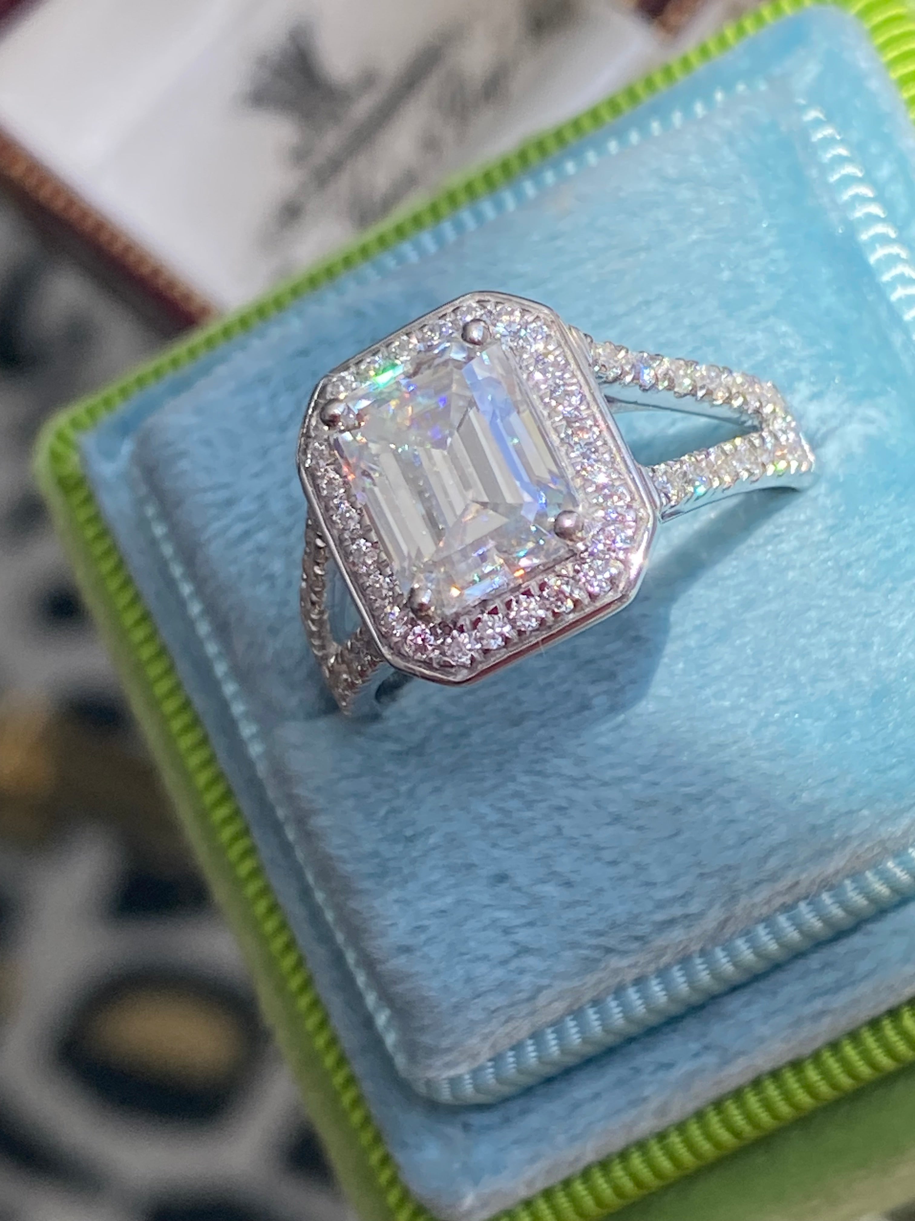3.10 CTW Emerald Cut Moissanite Halo Ring in Sterling Silver