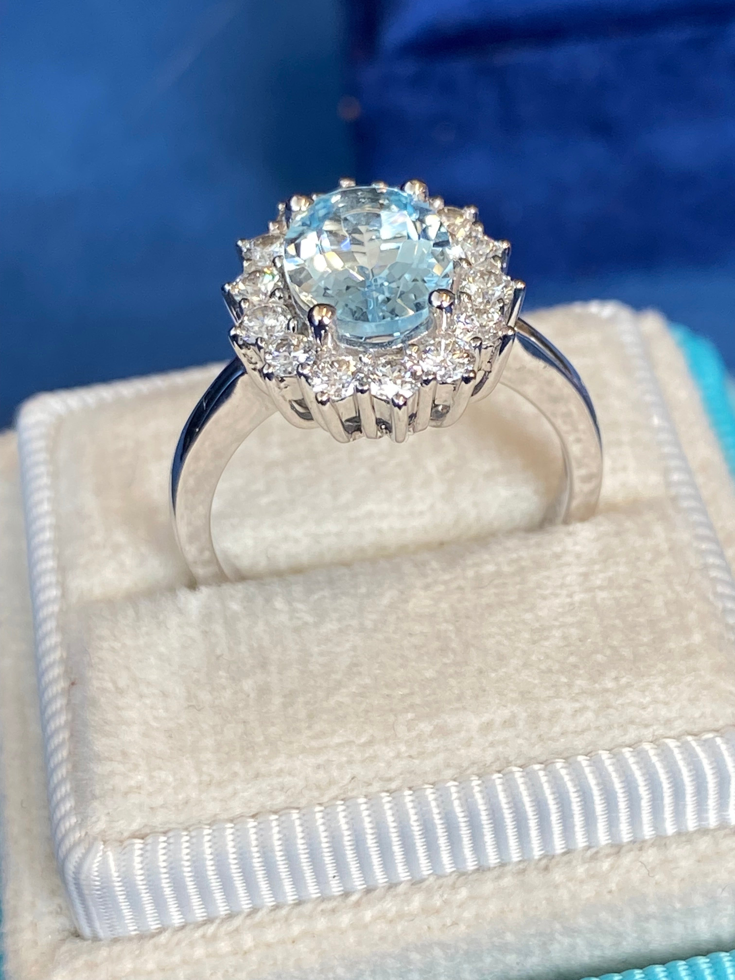 2.02 CTW Oval Cut Aquamarine and Natural Diamond Halo Engagement Ring in Platinum