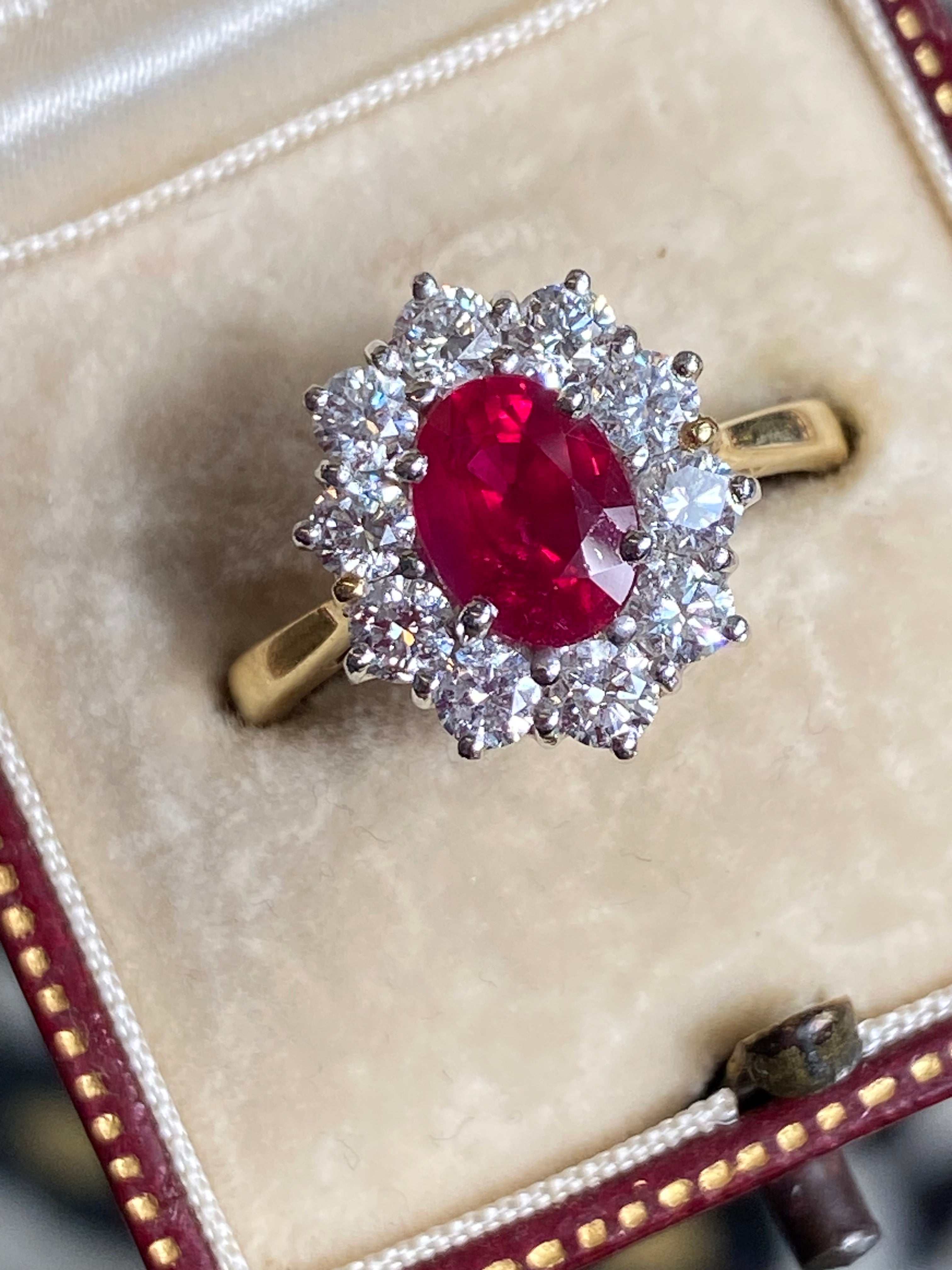 Breathtaking Ruby and Natural Diamond Halo Ring in 18ct Gold