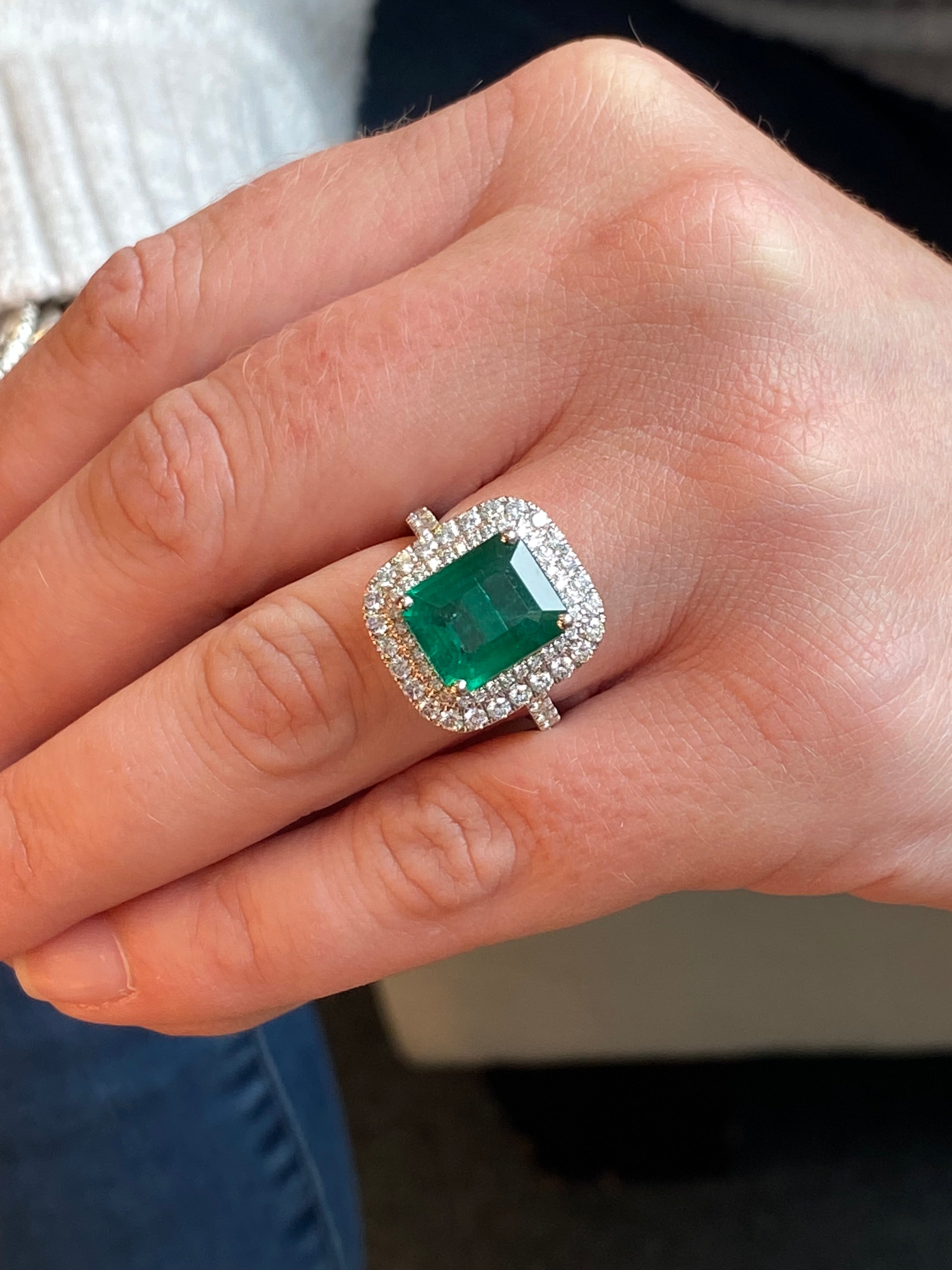 6.07 Carat Emerald Cut Emerald and Diamond Halo Ring in Platinum