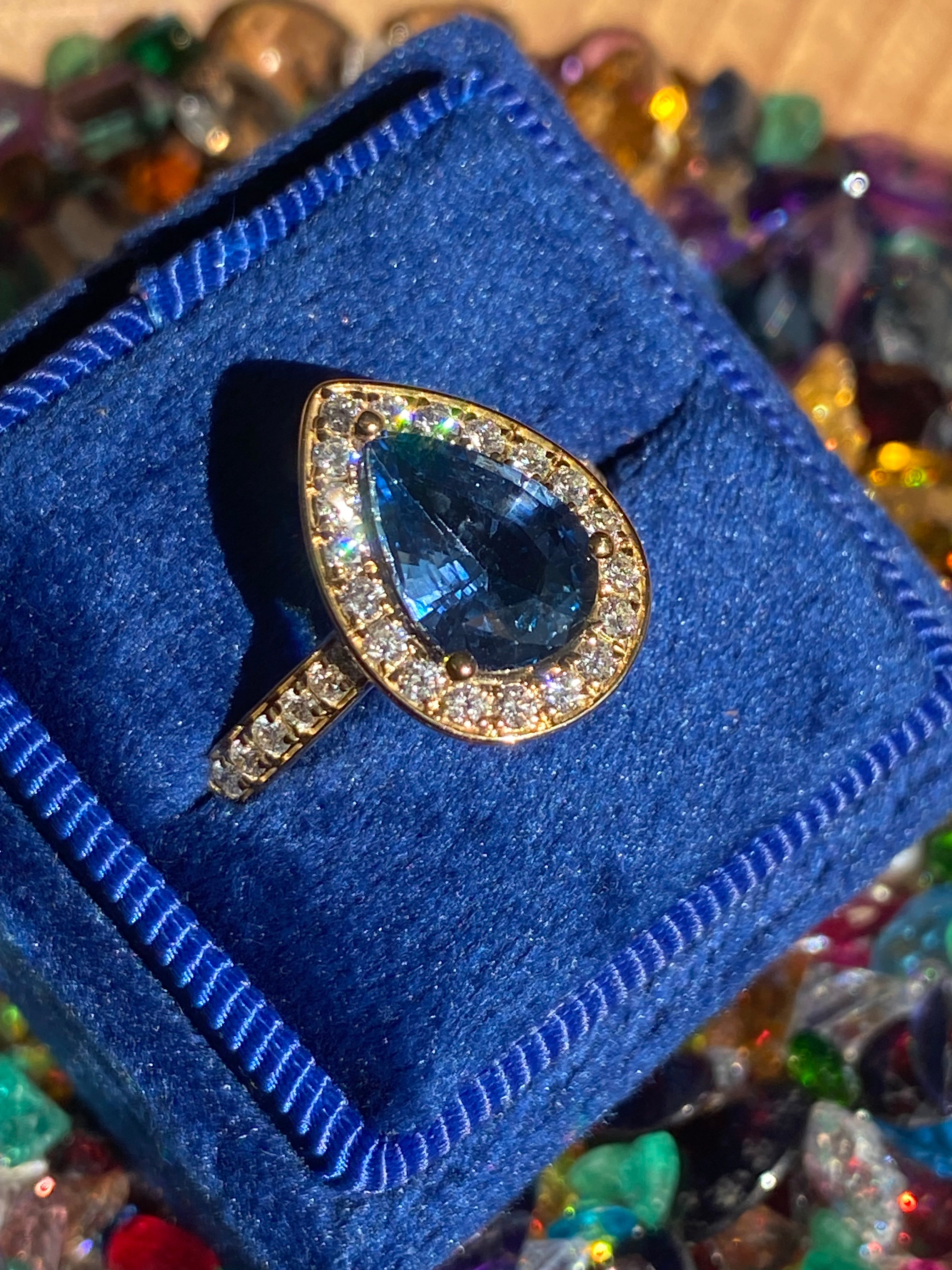 2.07 Carat Pear Cut Teal Sapphire and 0.48 CTW Natural Diamond Ring in 18ct Yellow Gold