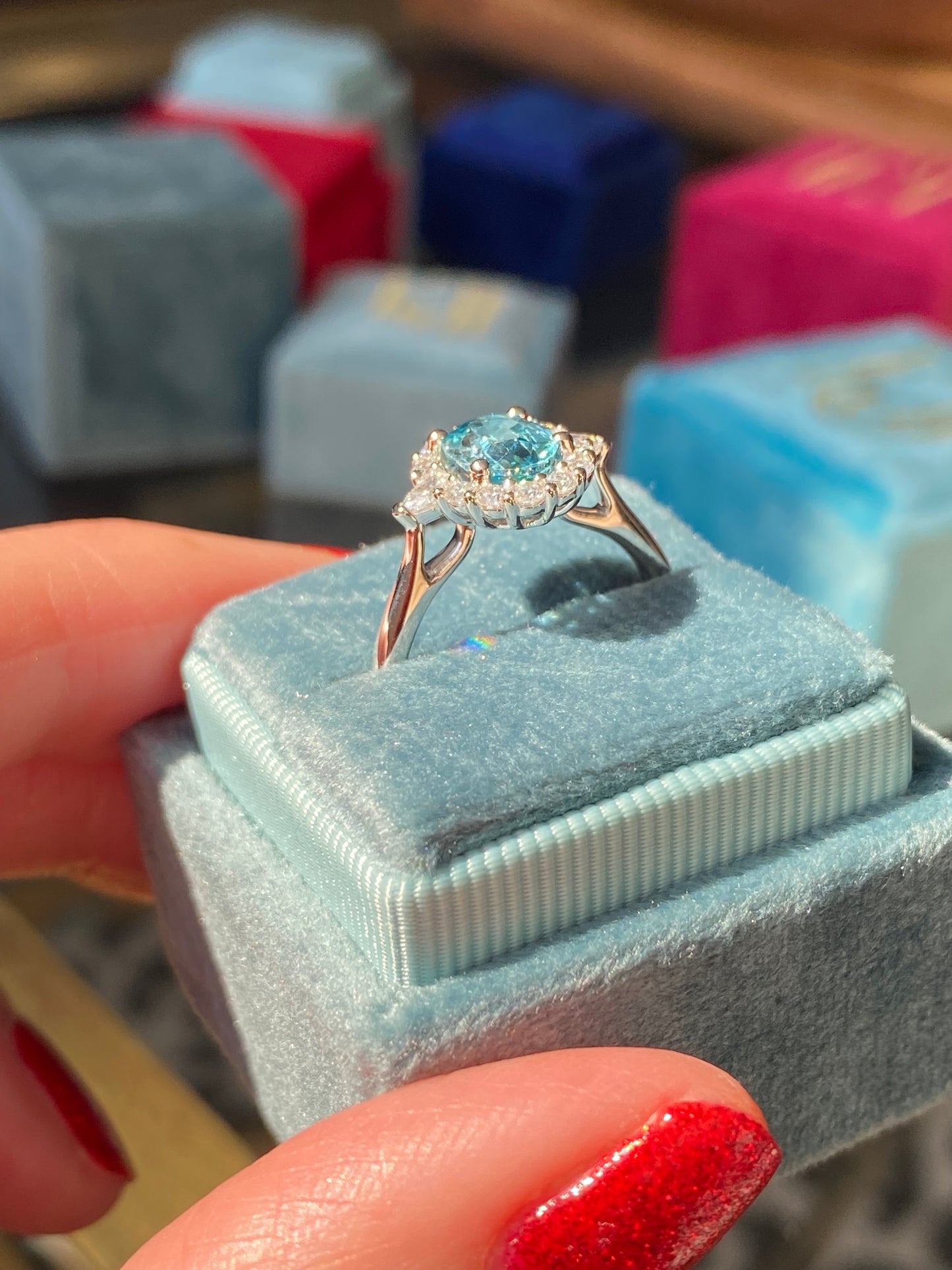 1.78 Carat Blue Zircon and Natural Diamond Halo Ring in Platinum