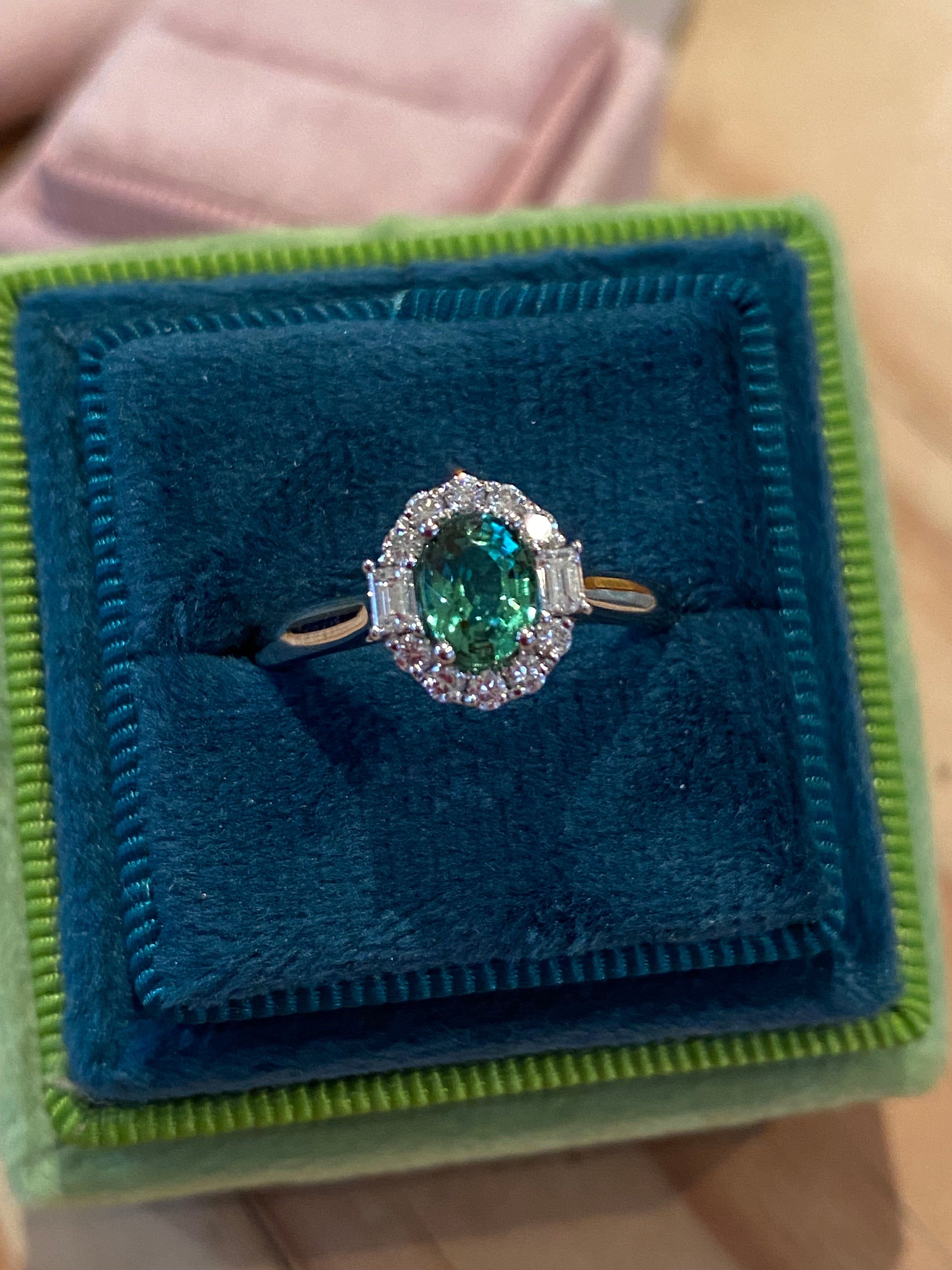 0.94 CTW Oval Cut Green Tourmaline and Natural Diamond Halo Ring in Platinum