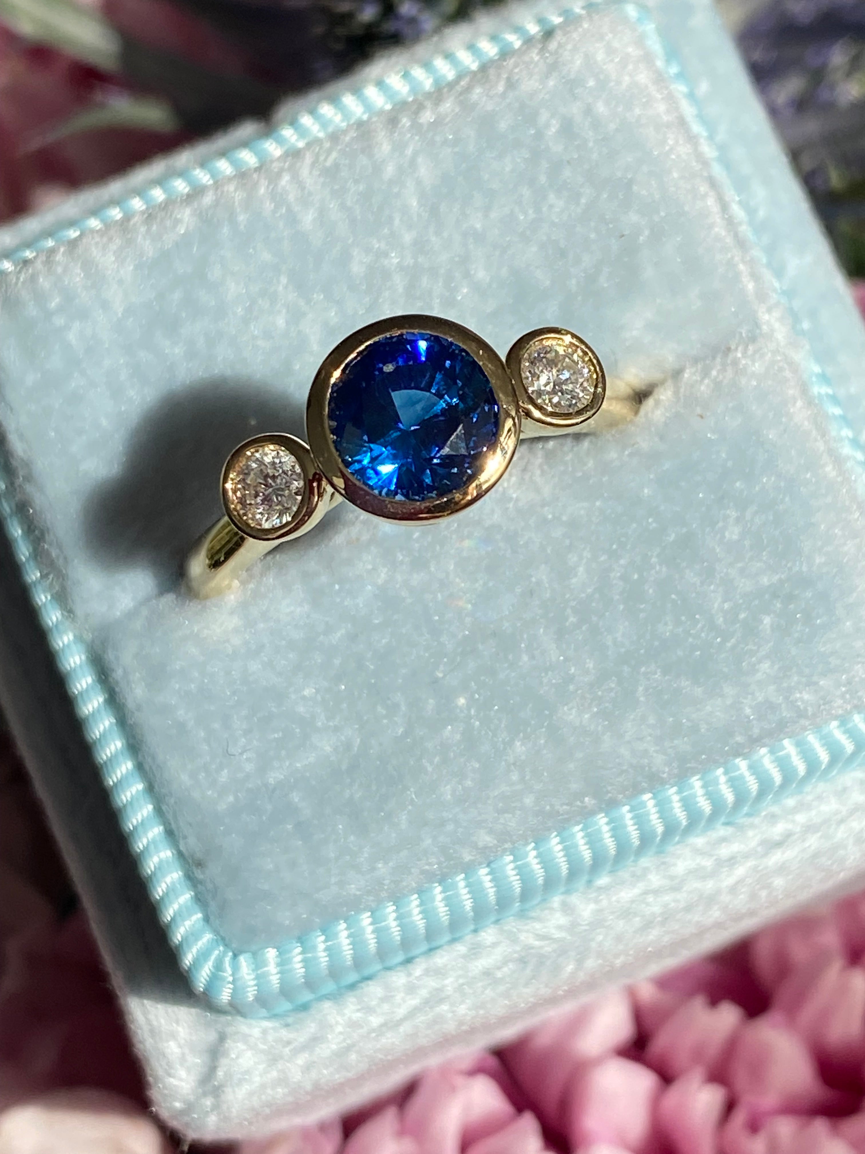 1.41 Carat Blue Ceylon Sapphire and 0.18 CTW Natural Diamond Halo Ring in 18ct Yellow Gold