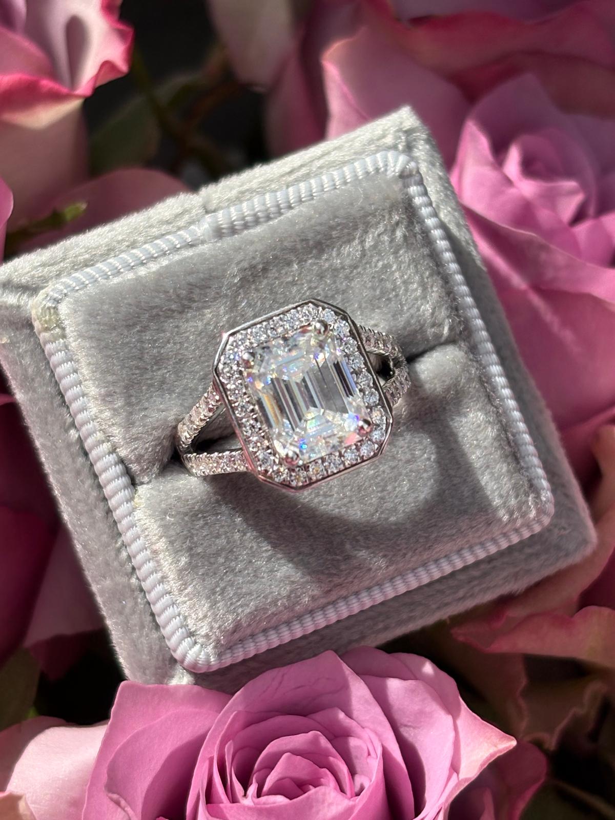 3.10 CTW Emerald Cut Moissanite Halo Ring in Sterling Silver