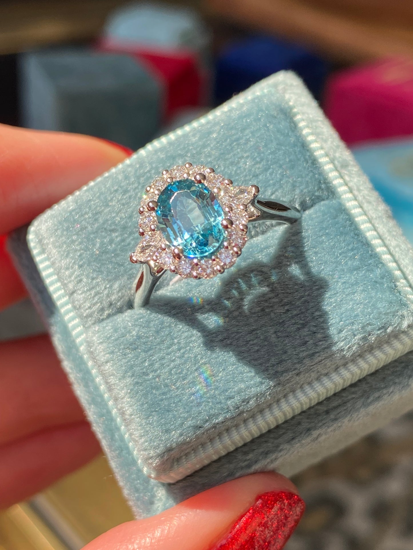 1.78 Carat Blue Zircon and Natural Diamond Halo Ring in Platinum