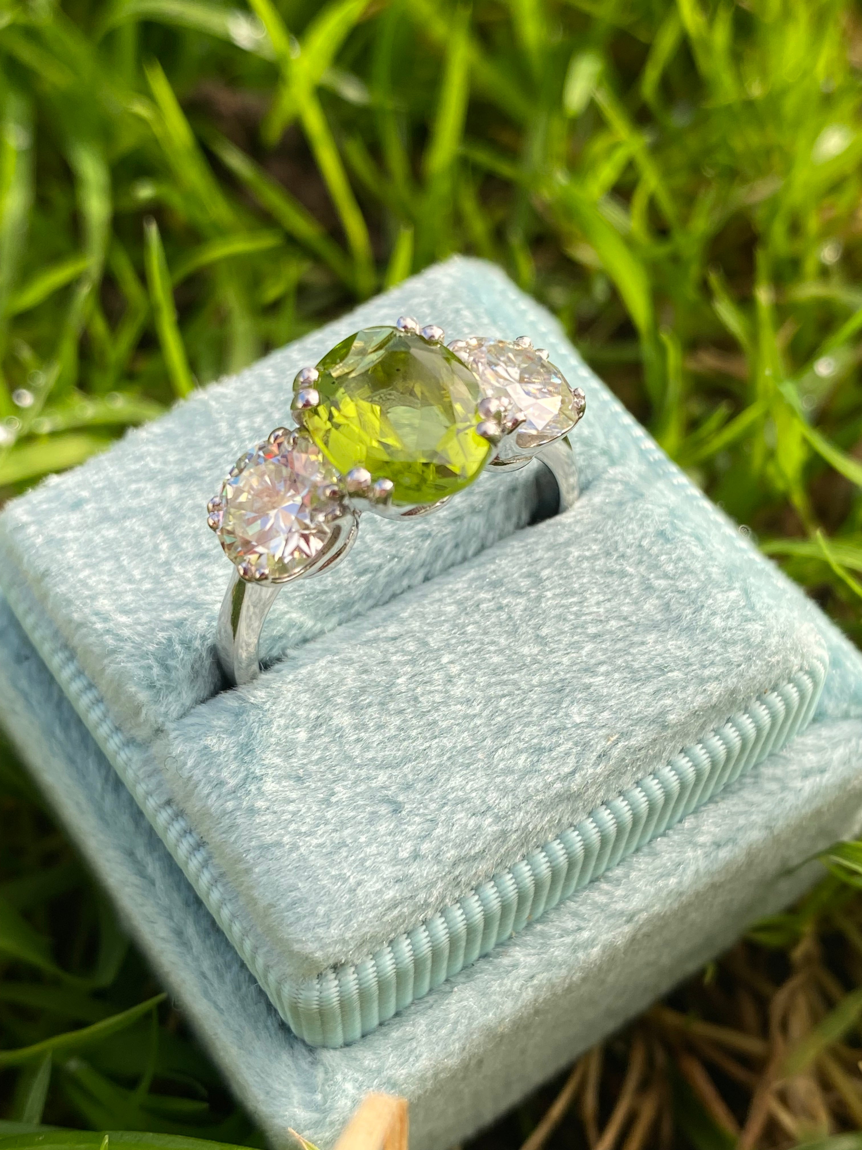 2.57 Carat Peridot and 1.84 Carat Moissanite Three Stone Ring in Sterling Silver