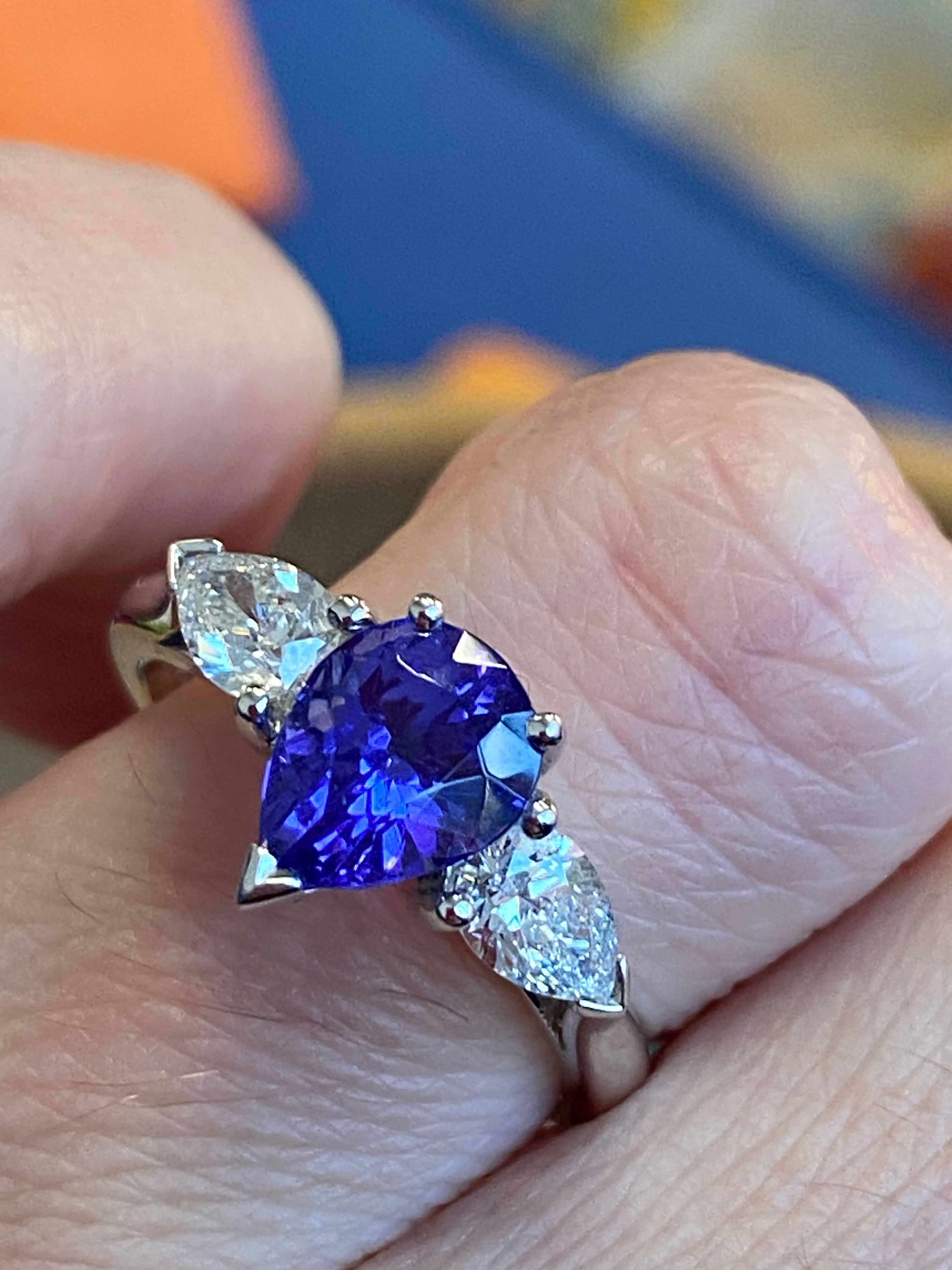 2.47 CTW Pear Cut Tanzanite and Natural Diamond Three Stone Ring in Platinum