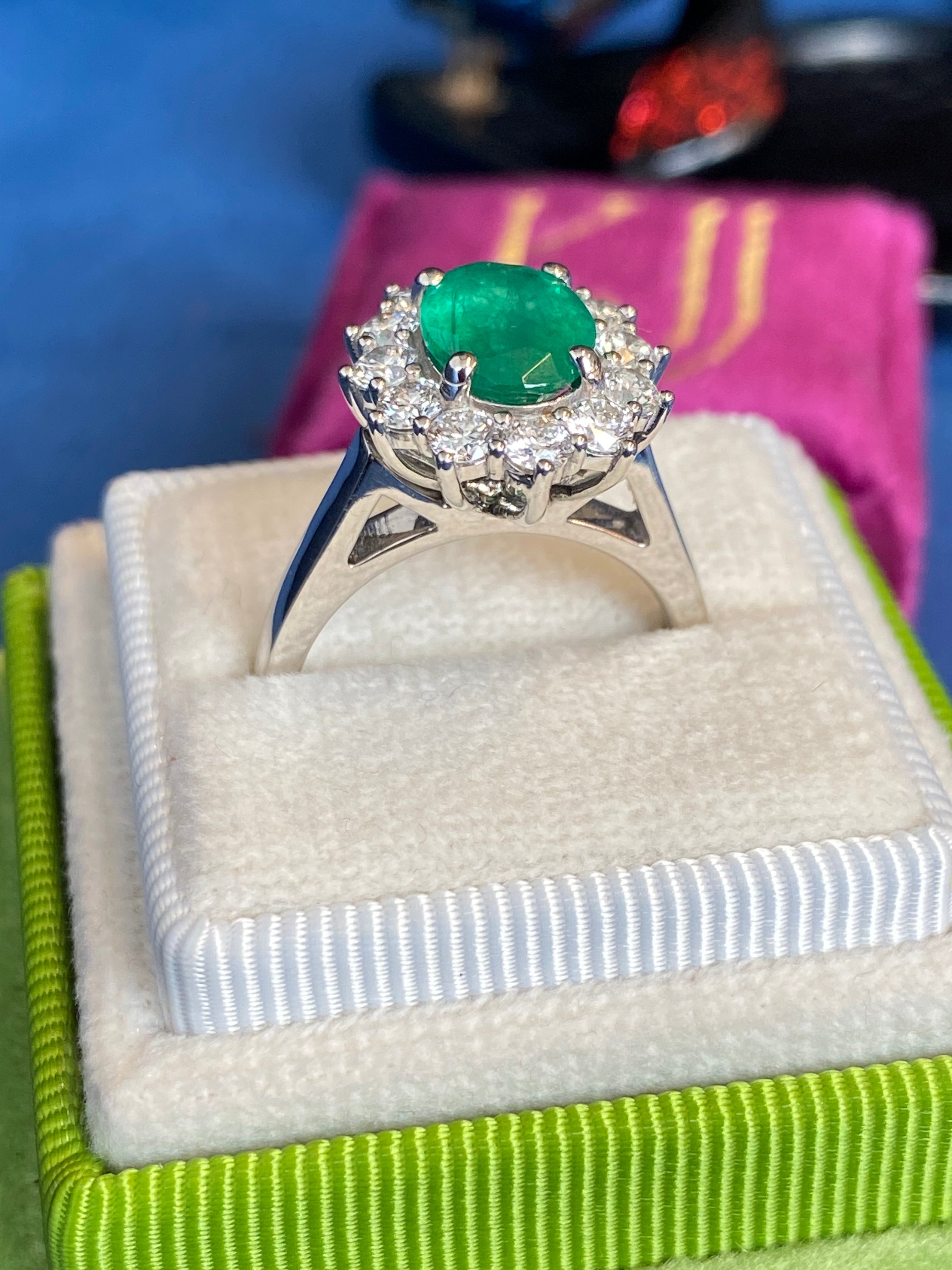 1.53 Carat Cushion Cut Emerald and 0.96 CTW Natural Diamond Halo Ring in Platinum