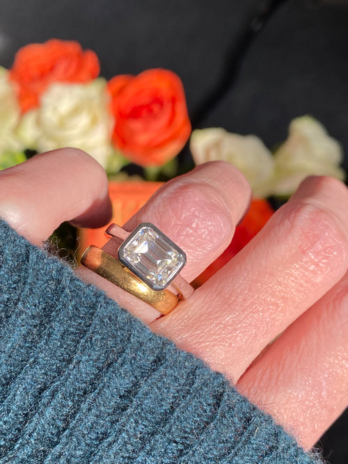 3.00 Carat Emerald Cut Moissanite East West Solitaire Ring in Sterling Silver