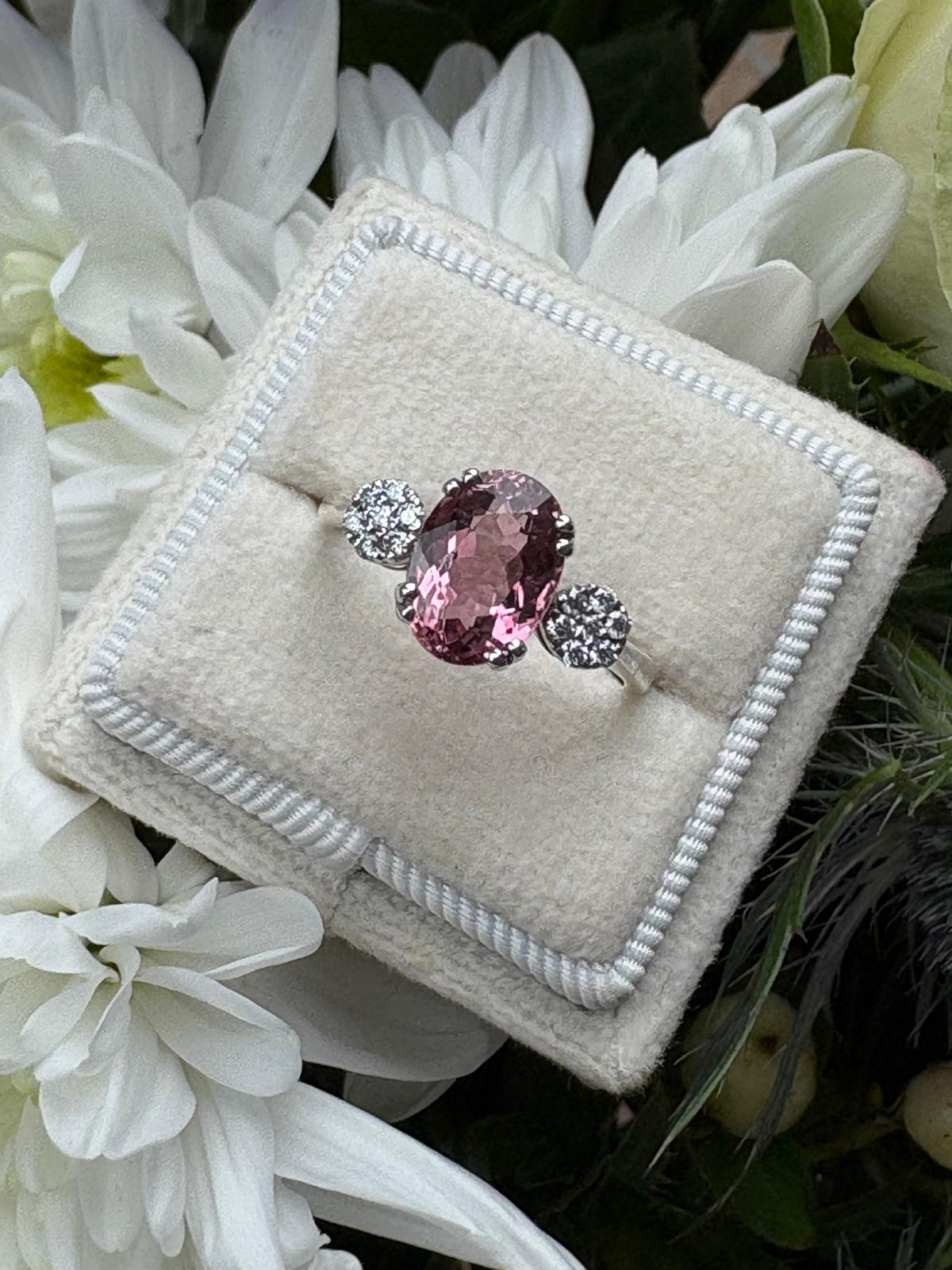 2.05 Carat Pink Tourmaline and Moissanite Three Stone Style Ring in Sterling Silver