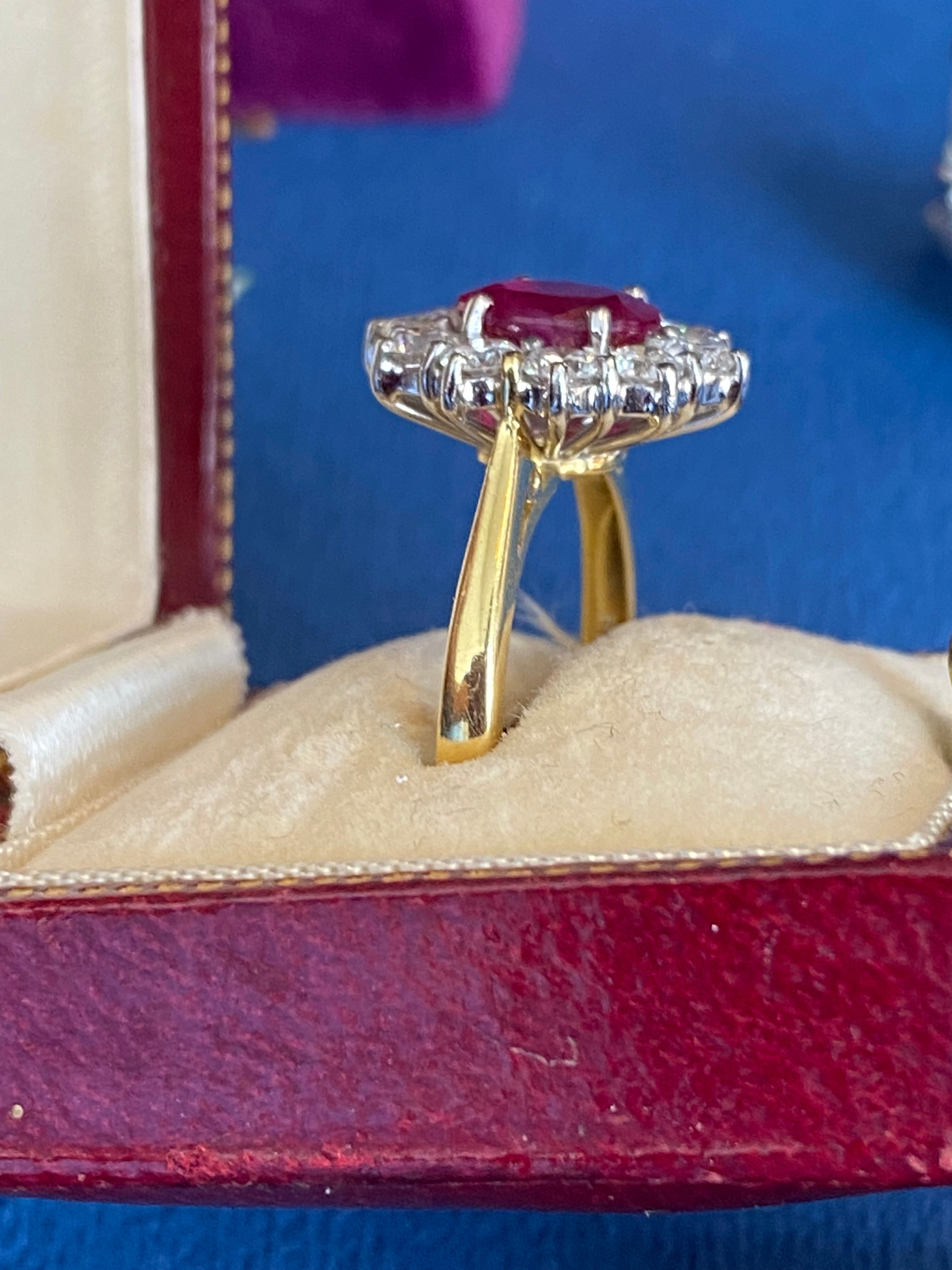 Breathtaking Ruby and Natural Diamond Halo Ring in 18ct Gold