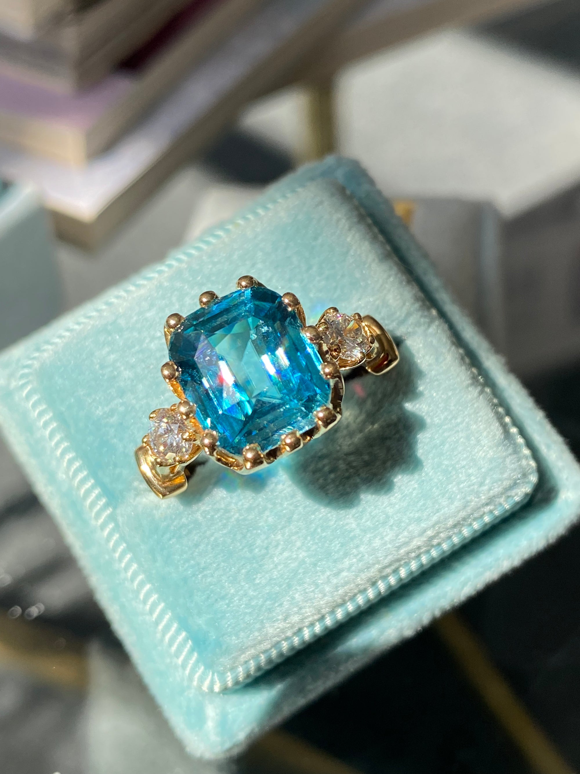 6.75 Carat Blue Zircon and Diamond Three Stone Ring in 18ct Yellow Gold