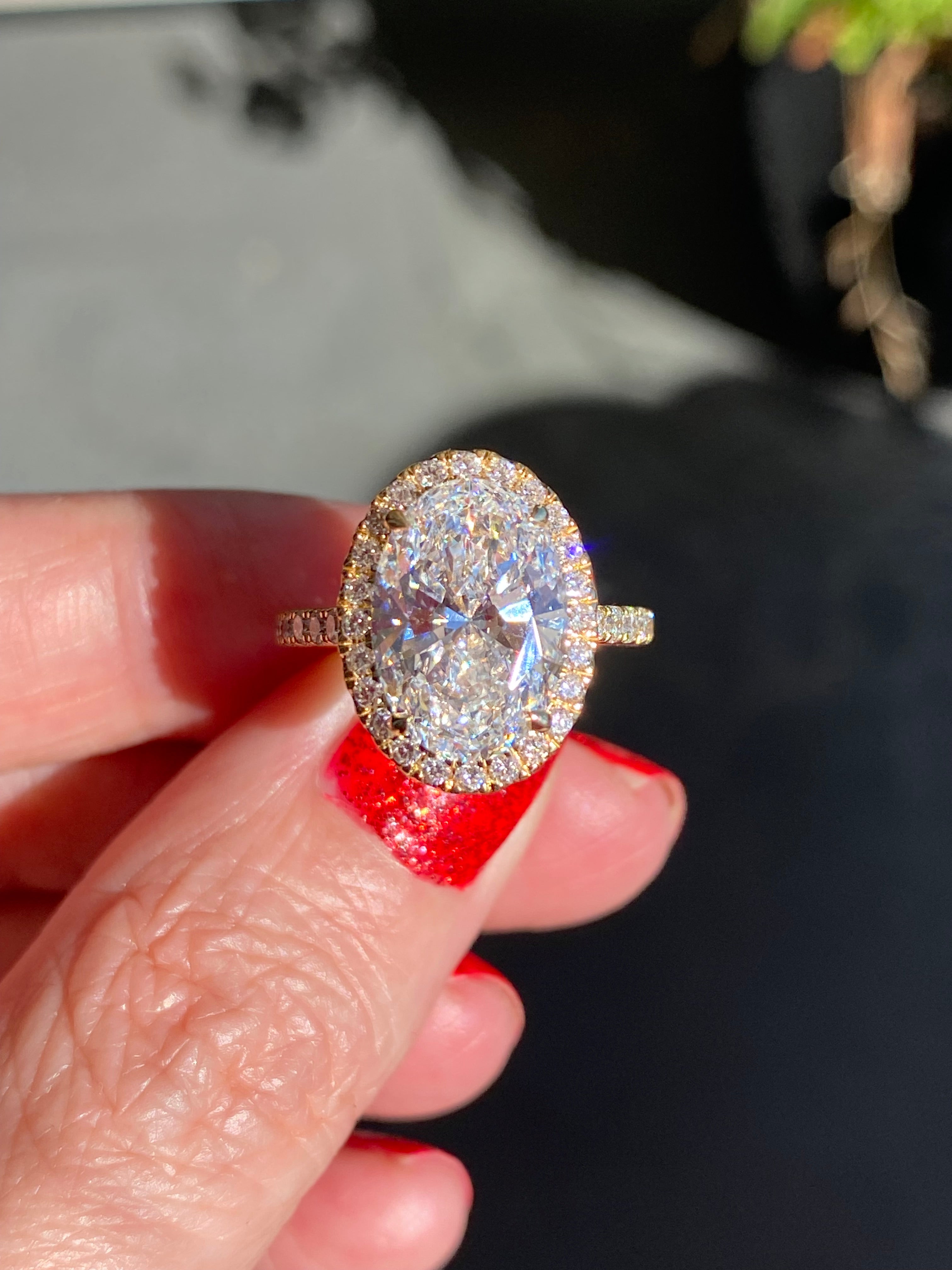 4.59 CTW Oval Cut Lab Diamond Halo Engagement Ring in 18ct Yellow Gold