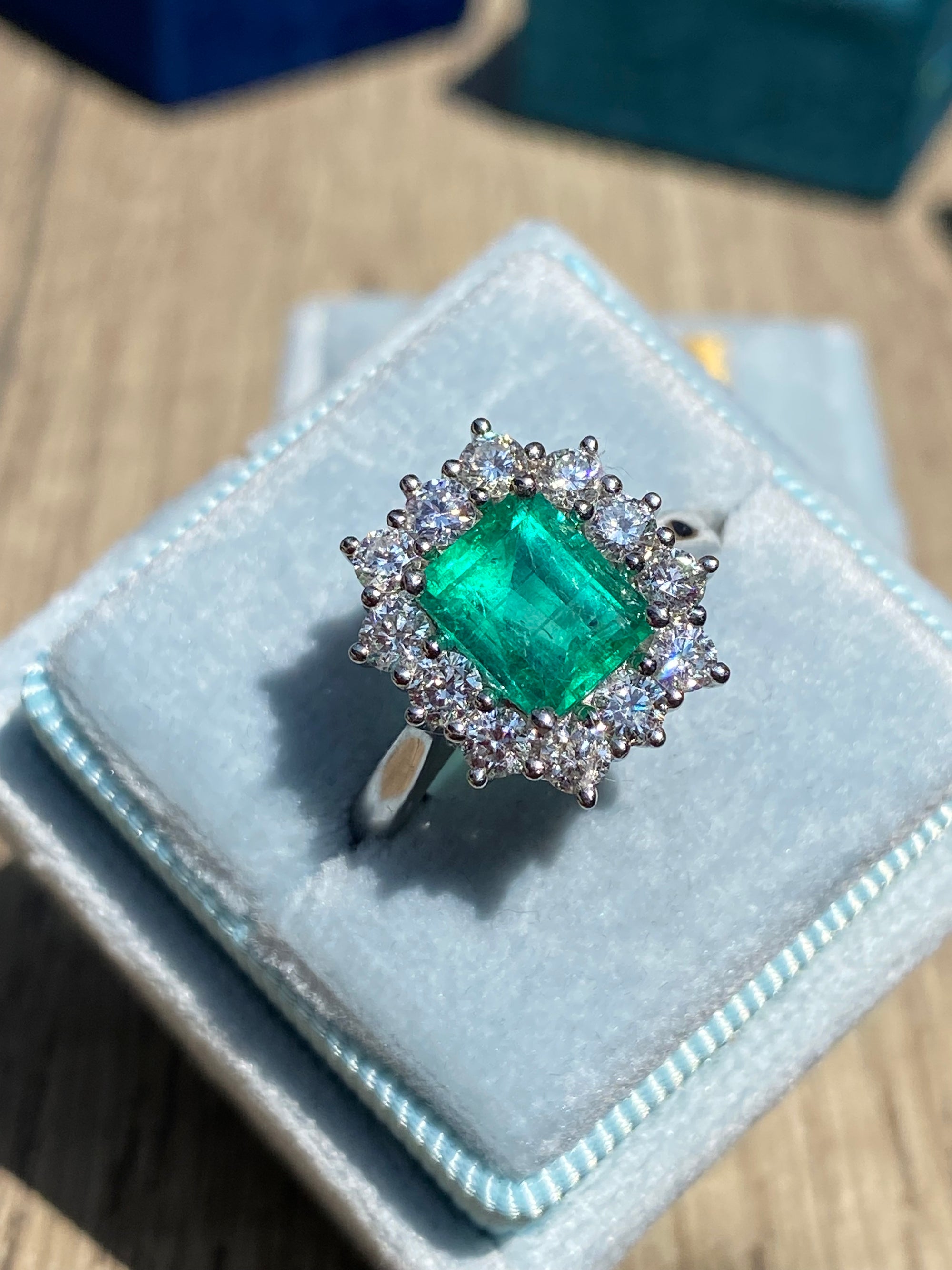 2.34 CTW Emerald Cut Colombian Emerald and Natural Diamond Halo Ring in Platinum
