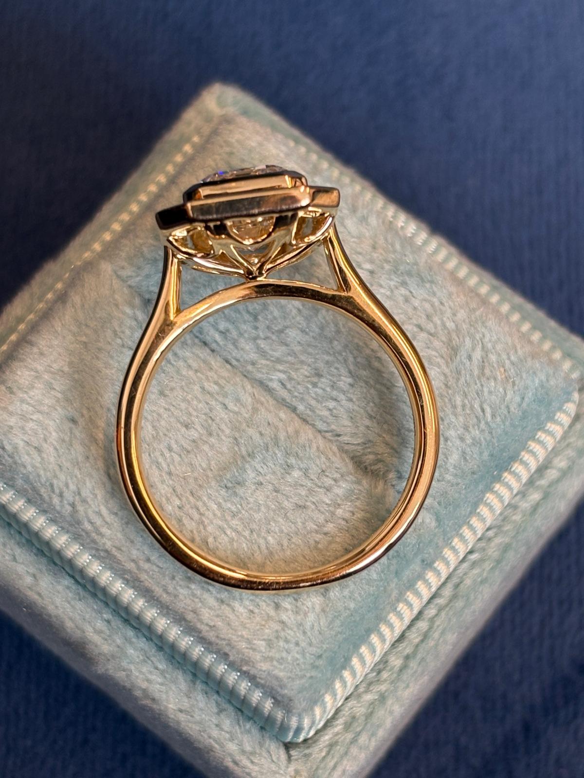 3.74 CTW Emerald Cut Lab Diamond Halo Engagement Ring in 18ct Yellow Gold