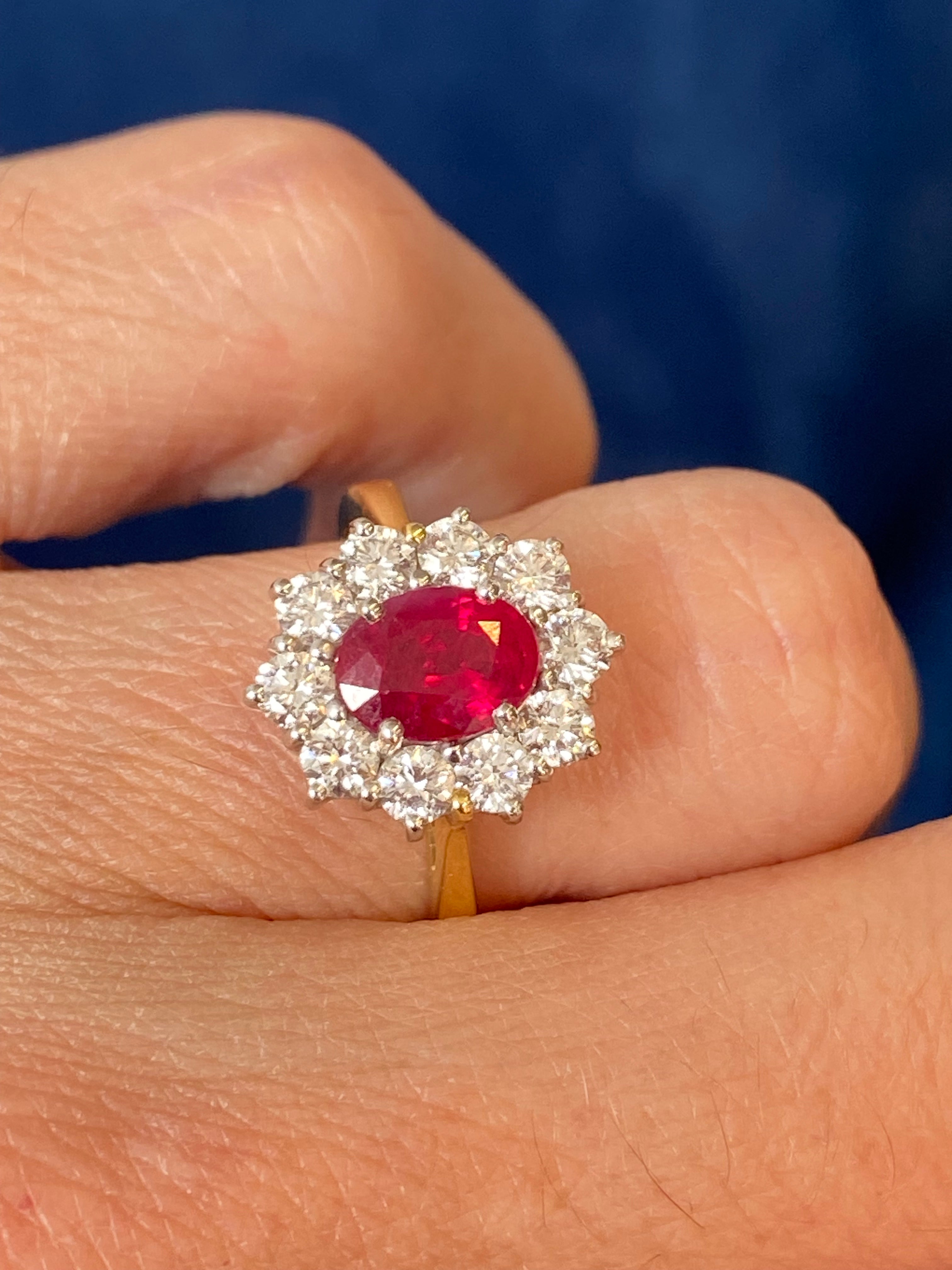 Breathtaking Ruby and Natural Diamond Halo Ring in 18ct Gold