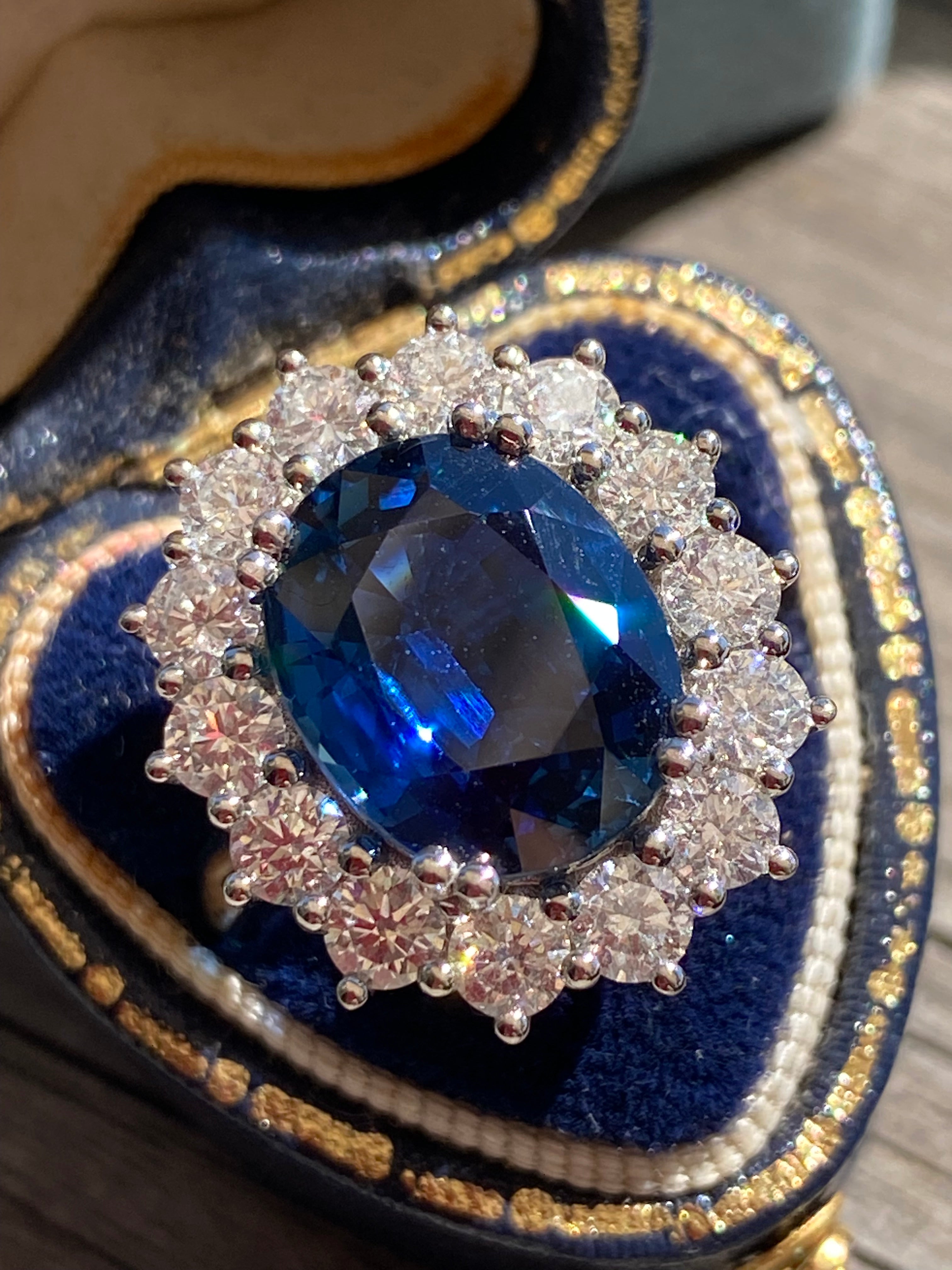 6.37 Carat Gubelin Certed No Heat Blue Ceylon Sapphire and 1.80 CTW Natural Diamond Halo Ring in Platinum