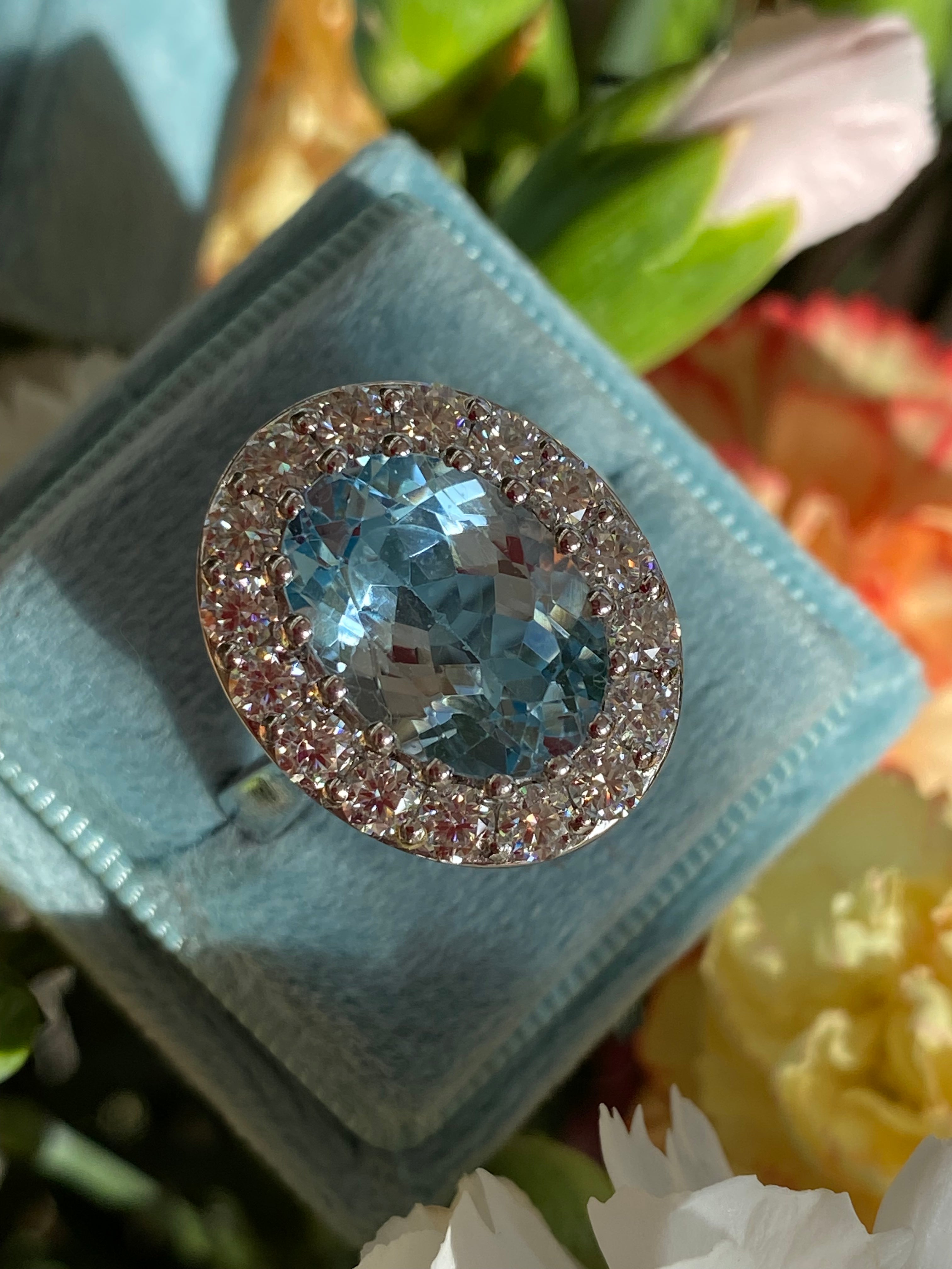 9.60 CTW Oval Cut Blue Topaz and Moissanite Halo Cocktail Ring in Sterling Silver