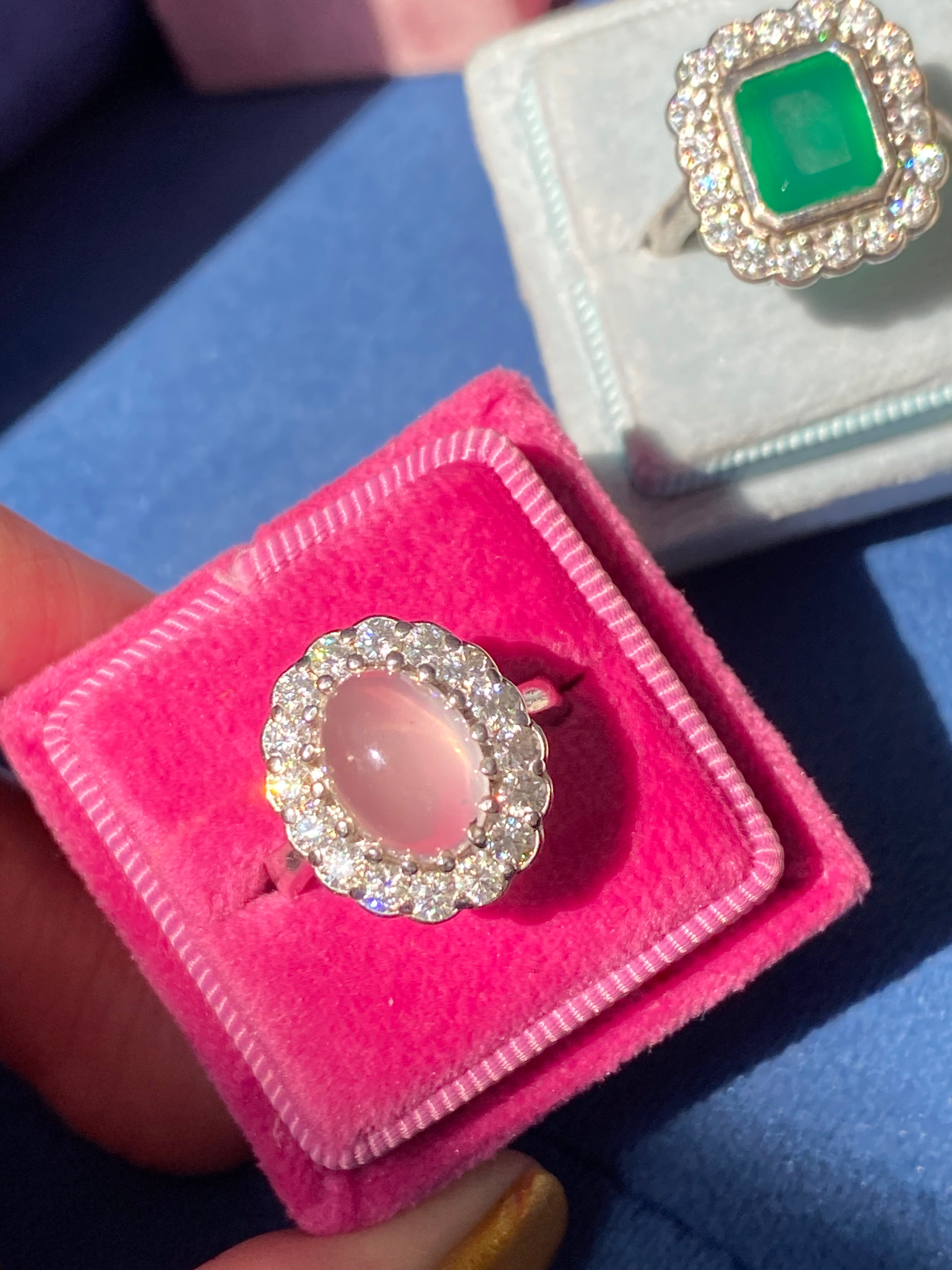 4.50 CTW Oval Cabochon Cut Rose Quartz and Moissanite Halo Cocktail Ring in Sterling Silver