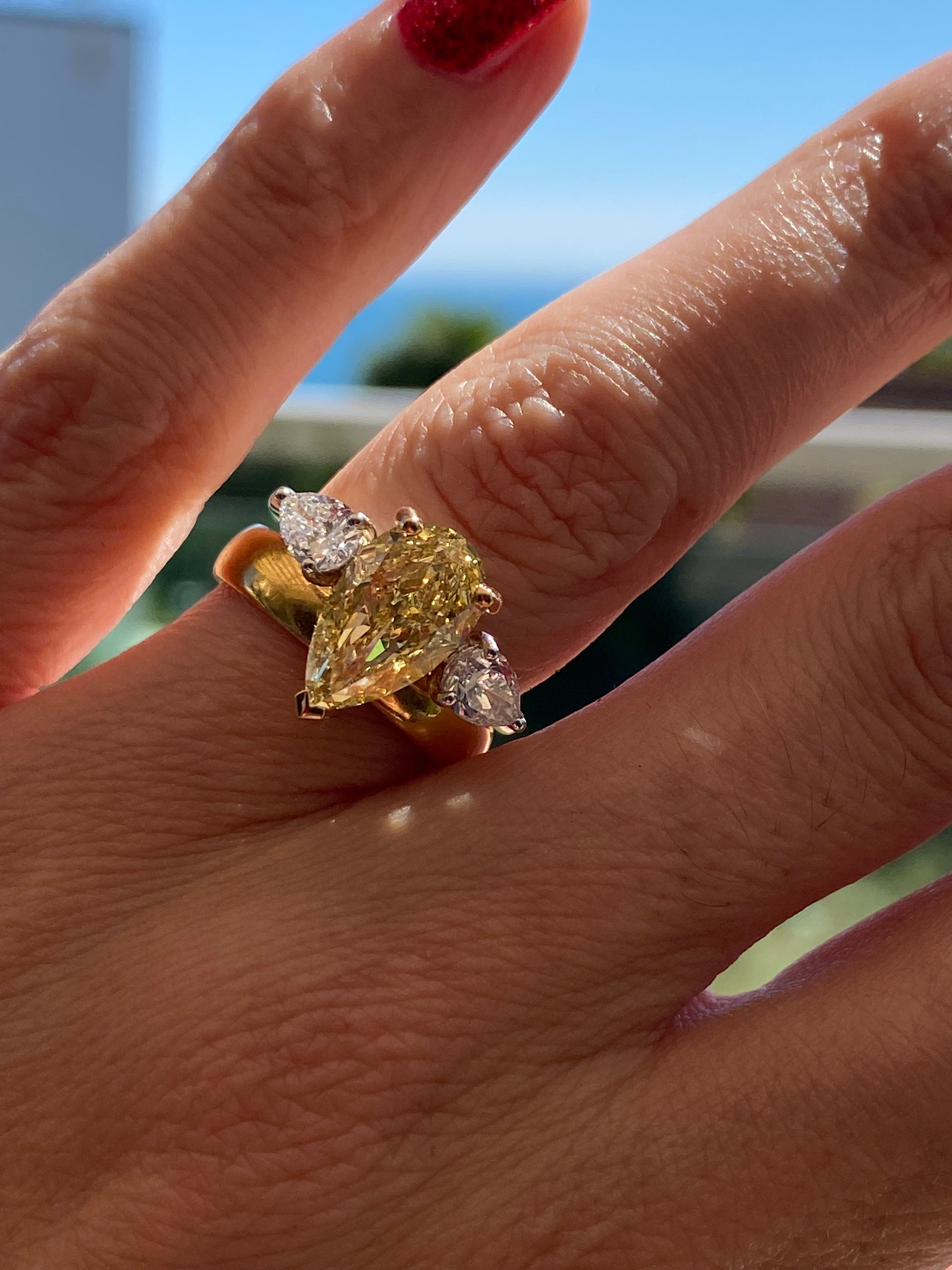 4.04 CTW Pear Cut Fancy Yellow Lab Diamond Three Stone Engagement Ring in 18ct Yellow and White Gold