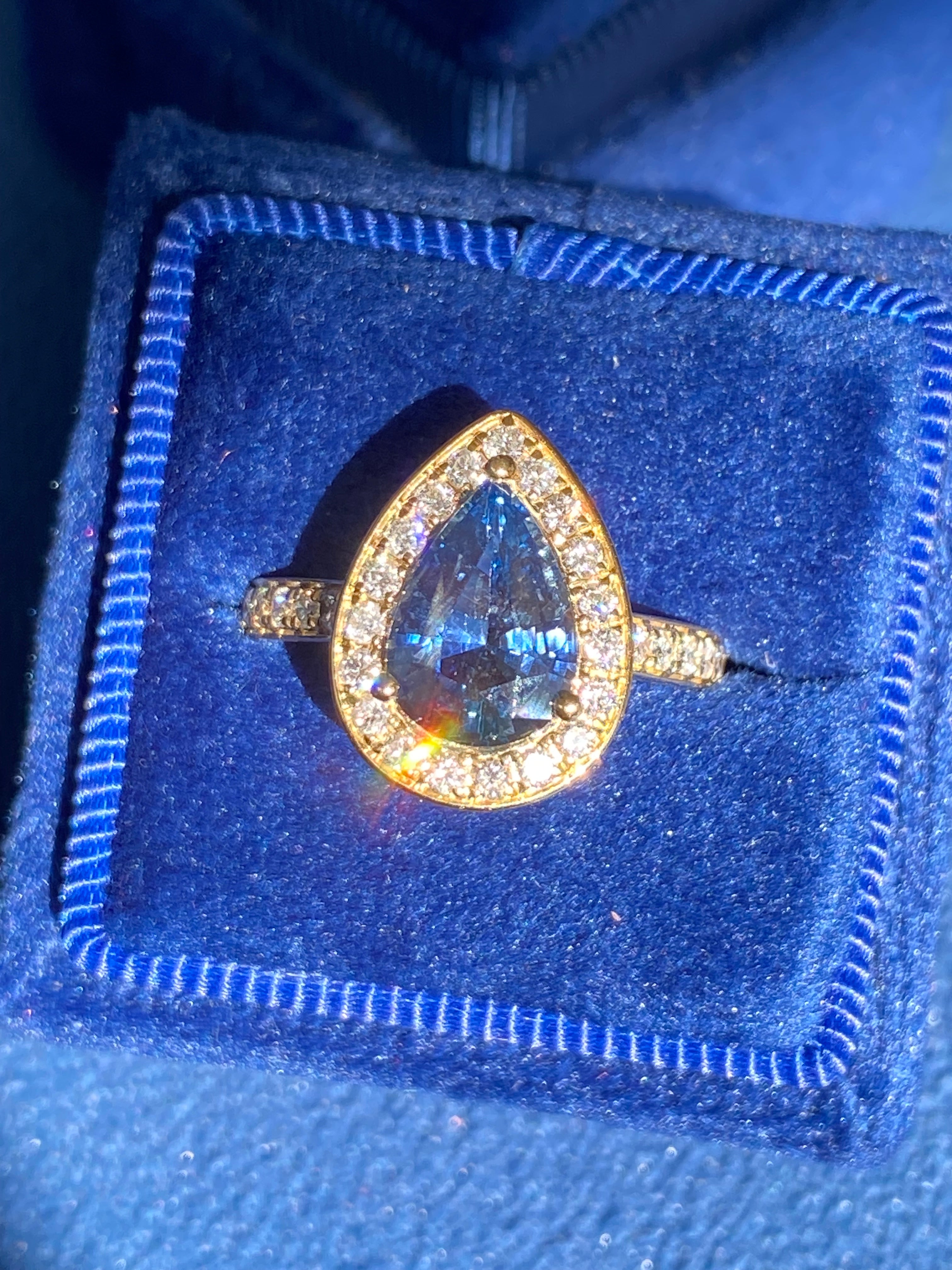 2.07 Carat Pear Cut Teal Sapphire and 0.48 CTW Natural Diamond Ring in 18ct Yellow Gold
