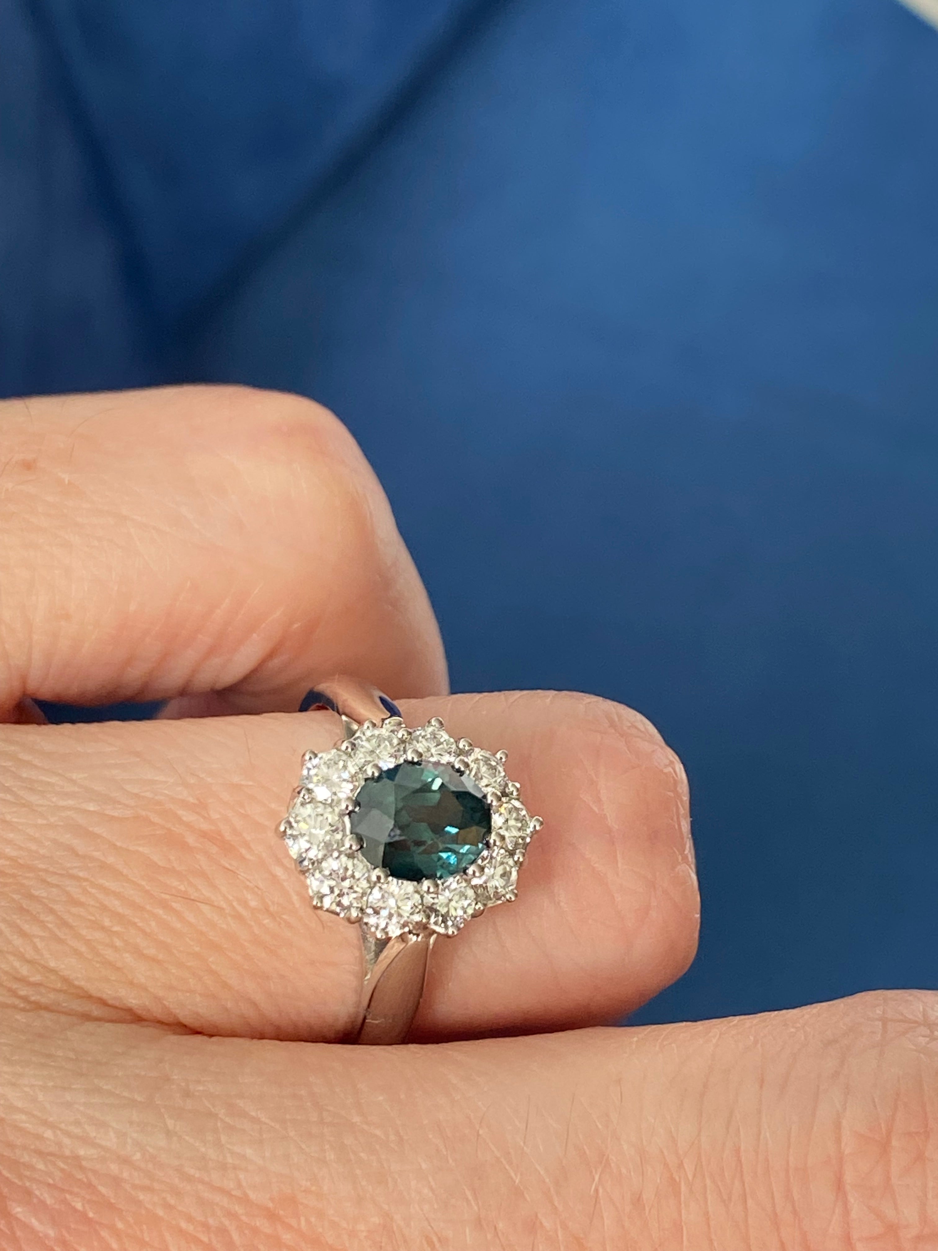 2.18 CTW Oval Cut Teal Sapphire and Natural Diamond Halo Ring in Platinum