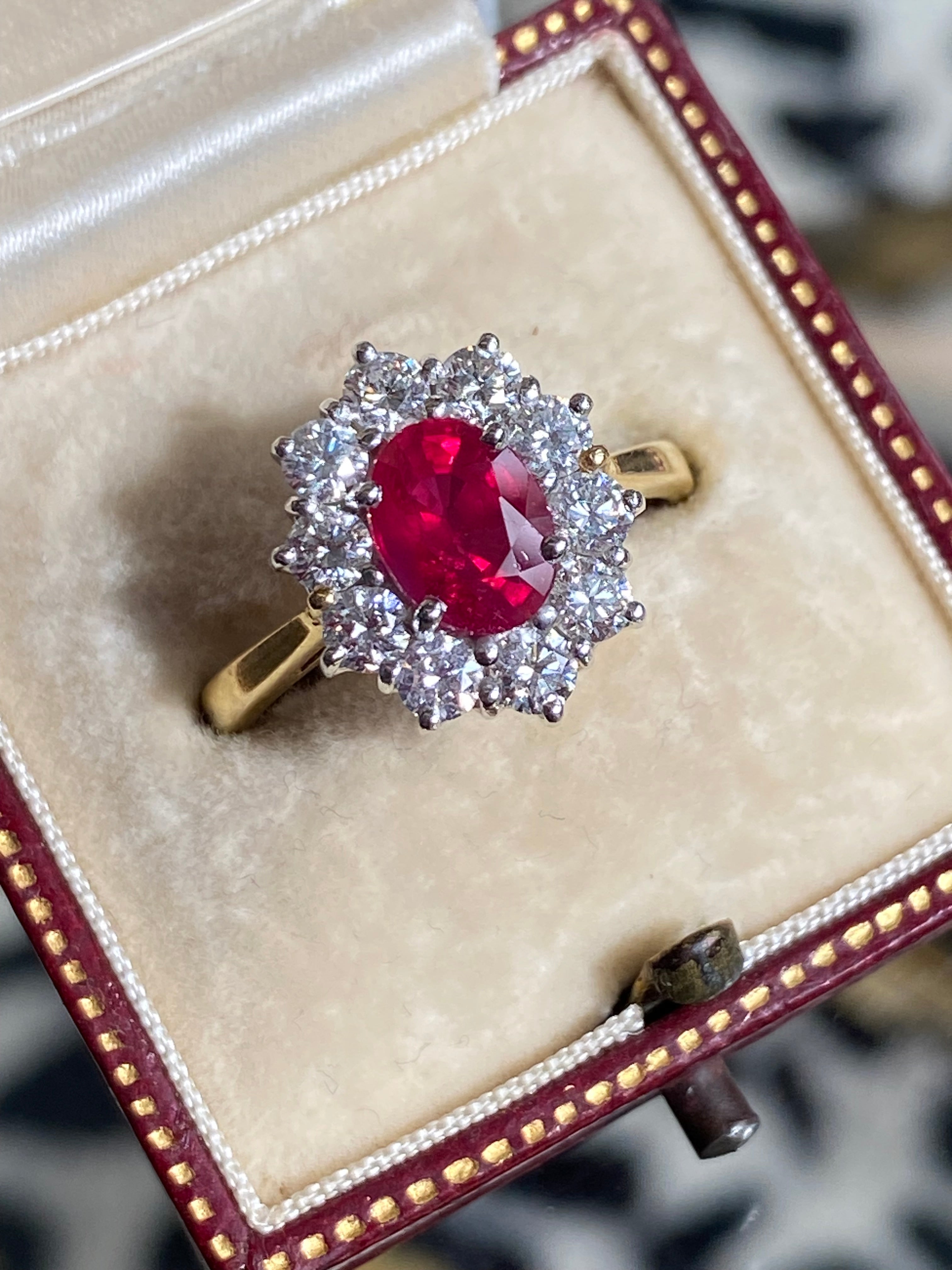 Breathtaking Ruby and Natural Diamond Halo Ring in 18ct Gold