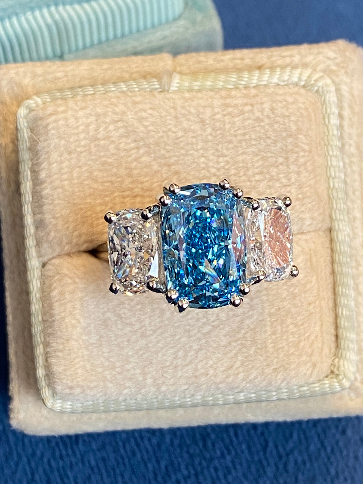 6.60 CTW Fancy Blue Cushion Cut Lab Diamond Graduated Three Stone Ring in Platinum