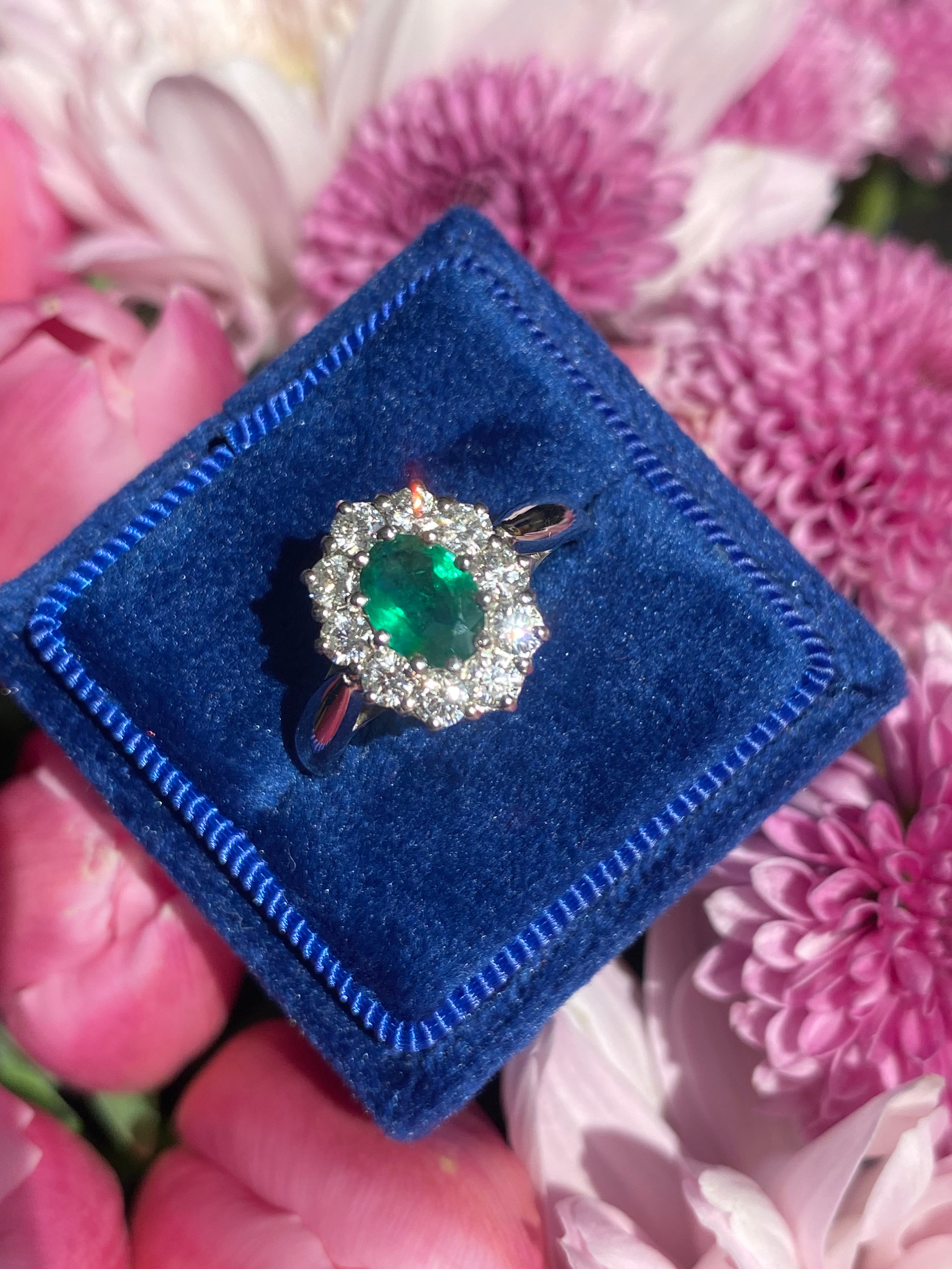 0.60 Carat Emerald and 0.66 ctw Natural Diamond Halo Engagement Ring in Platinum